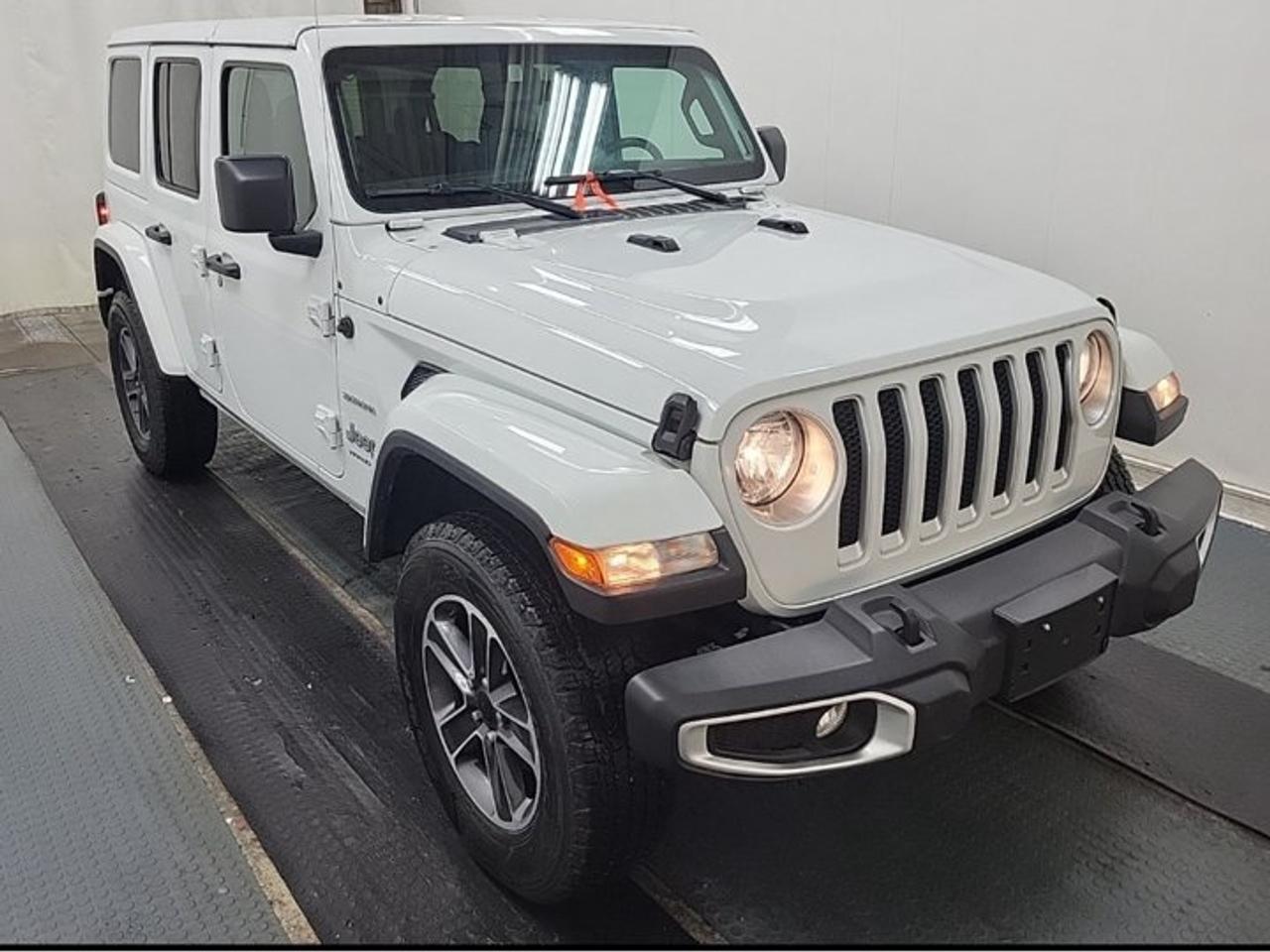 2023 Jeep Wrangler Sahara 4X4 | V6 | Tow Pkg | Heated Wheel + Seats | Remote Start | Body Colour Hardtop | and More ! Photo