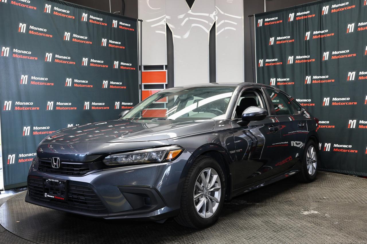 <p class=p1>Special Finance Price: $24,999 | Cash Price: $26,499</p><p class=p1>2024 Honda Civic EX Auto - One Owner Vehicle, Ontario Vehicle - Apple CarPlay, Android Auto, Sunroof, Backup Camera, Blind Spot Assist, Lane Departure Warning, Collision Warning, Active Cruise Control, Heated Seats, Heated Steering Wheel, Alloy Wheels, Cruise Control, AUX, And Much More.</p><p class=p1>Odometer: 82,000 KM.</p><p class=p1>Call Us:&nbsp;(416) 766-6226</p><p class=p1>Monaco Motorcars Inc.</p><p class=p1>Location: 112 King St, Barrie</p><p class=p1>Business Hours:</p><p class=p1>Monday - Friday: 10am - 6pm</p><p class=p1>Saturday: 10am - 5pm</p><p class=p1>Sunday : 10am - 3pm</p><p class=p1>www.monacomotorcars.com</p><p class=p1>Apply for Financing Online:&nbsp;www.monacomotorcars.com/financing/</p><p class=p1>All our vehicles go through an Ontario Standard Certification Inspection where we make sure the car is safe so you don&rsquo;t have to. An additional cost of $999 will be applied to all Certified vehicles. If not certified as per OMVIC regulations vehicle is not drivable, not certified and not e-tested. Each Certified vehicle comes with an Ontario Safety Certification and a 36-day or 2000 KM Safety Warranty. At Monaco Motorcars, we are revolutionizing the car buying experience. Come see the difference. Full vehicle history is disclosed prior to closing a deal because we want you to know everything about your next vehicle. Countless Financing options are available including $0 DOWN!!! (O.A.C.) All credit types welcome! Bad/Good/No Credit, bankruptcy, consumer proposal, new to Canada, student. Hassle-free approvals. No matter what your credit situation is, You Are Approved. Conditions apply. We Accept Trade-Ins! Bring it by for an Appraisal. Multiple extended warranty options are available to choose from.</p><p class=p1>We Are Proud To Serve Clients All Over Canada & Ontario - Toronto, Markham, Richmond Hill, Mississauga, Oshawa, Etobicoke, Newmarket, Pickering, Whitby, Ajax, North York, Scarborough, Barrie, Orangeville, Waterloo, Milton, Kitchener, Ottawa, Aurora, London, Kingston, Hamilton, Muskoka, Belleville, Brant, Brantford, Brockville, Cornwall, Windsor, Sudbury, Guelph, Orillia, Sarnia, Timmins, Thunder Bay, Welland, Pembroke, St Catharines, St. Thomas, Thorold, Ottawa, Owen Sound, Haldimand County, Kenora and Niagara Falls.</p><p class=p1>PRICES DISPLAYED: HST and licensing fees are not included.</p><p class=p1>FINANCING OPTIONS: Enjoy rates as low as 6.99% with $0 down and no payments for 3 months (O.A.C). Our expert financing team partners with major banks and lenders to secure the lowest rates and most flexible terms for your car loan. A $999 documentation fee applies.</p><p class=p1>We strive to provide accurate and up-to-date listing information; however, Monaco Motorcars is not responsible for any errors, omissions, or typographical mistakes. Prices are subject to change without notice. Please contact us to confirm details.</p>
