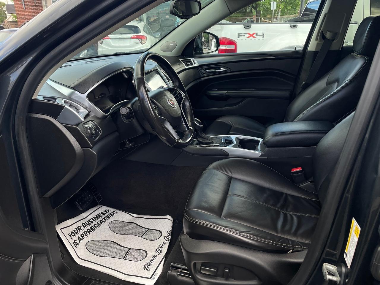 2014 Cadillac SRX FWD *HEATED LEATHER SEATS, ECO MODE, SAFETY* Photo