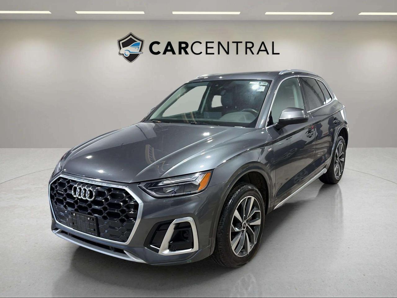 Progressiv S Line AWD, 2.0T, Quattro AWD, Panoramic Sunroof, Leather Seating, Apple CarPlay & Android Auto, Virtual Cockpit, Backup Camera, Blind Spot Monitoring, Previous Daily Rental.

The 2022 Audi Q5 Progressiv S Line delivers a refined balance of performance and luxury with its 2.0L turbocharged engine and Audis Quattro all-wheel drive system. The S Line Package adds sporty styling, while the panoramic sunroof and leather seating enhance comfort and premium feel. Inside, the Virtual Cockpit and Apple CarPlay & Android Auto provide modern connectivity, and advanced safety features like blind spot monitoring and a backup camera add confidence to every drive.

CARFAX: Free Carfax report on all our listing. Just go on our website and click view Carfax report.


CERTIFICATION: Have your new pre-owned vehicle certified at Car Central! We offer a full safety inspection exceeding industry standards including oil change, and professional detailing prior to delivery. Vehicles are not drivable, if not certified and not e-tested, certification package is available for $749. All trade-ins are welcome. Taxes, licensing are extra.


PRICE: We believe everyone deserves to get the best price possible on their new pre-owned vehicle without having to go through uncomfortable negotiations. Our Market Value Pricing (MVP) allows you to buy with confidence. We do this by constantly monitoring the market and adjusting our prices below the market average you can buy confidently knowing you are getting the best price possible! No haggle pricing. No pressure. Why pay more somewhere else. **CASH PRICE** will be an additional $1750 and it will include 1 Year or 15,000 kms Powertrain warranty. 


SERVICE: Schedule an appointment with Car Central Service Centre to bring your vehicle in for all its needs. Simply click on the link below and book your appointment. Our licensed technicians and repair facility offer the highest quality services at the most competitive prices. All work is manufacturer warranty approved and comes with 2-year parts and labour warranty. Start saving hundreds of dollars by servicing your vehicle with Car Central. Call us at 705-503-5000 or follow this link to book an appointment today! https://www.carcentral.ca/contact-us/


WARRANTY: This vehicle qualifies for an extended warranty with different terms and coverages available. Dont forget to ask for help choosing the right one for you.


FINANCING: No credit? New to the country? Bankruptcy? Consumer proposal? Collections? You dont need good credit to finance a vehicle. Bad credit is usually good enough. Give our finance and credit experts a chance to get you approved and start rebuilding credit today! On the spot financing, instant approvals, and no payments for 6 months is also available O.A.C!


Any vehicle stock number starting with Letter R are Previous daily Rental.


With over 30 years of experience, Car Central is a proud family-owned business and a trusted member of the UCDA. Our mission is to offer not only the best prices but also high-quality, reliable vehicles and an exceptional customer experience. We believe in making your car buying journey stress-free, with absolutely no pressurejust honest service you can rely on."