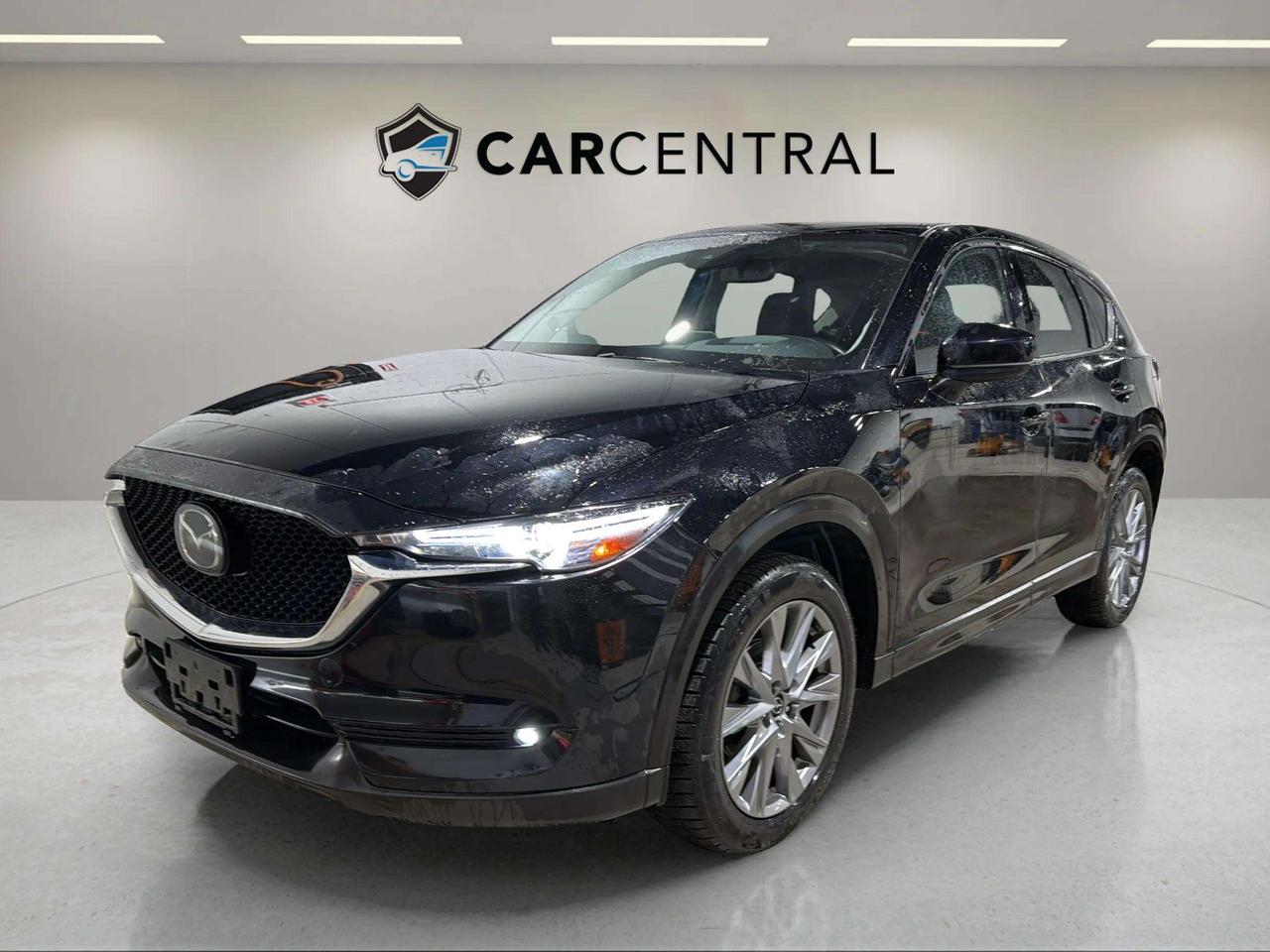 GT, 2.5L 4-Cylinder Engine, 6-Speed Automatic, AWD, Leather Seats, Heated Front Seats, Heated Steering Wheel, Power Sunroof, Bose Premium Audio System, 10.25" Display, Apple CarPlay, Android Auto, Adaptive Cruise Control, Lane Keep Assist, Blind Spot Monitoring, Rear Cross Traffic Alert, Rear View Camera, Power Liftgate.

The 2021 Mazda CX-5 GT is a premium compact SUV powered by a 2.5L 4-cylinder engine paired with a 6-speed automatic transmission and all-wheel drive, delivering smooth performance and confident handling in all conditions. The GT trim enhances comfort and refinement with upscale interior materials, advanced safety technology, and premium audio features. With its responsive driving dynamics, elegant design, and everyday practicality, the CX-5 GT is a strong choice for both commuting and longer drives. Available now in Barrie.

CARFAX: Free Carfax report on all our listing. Just go on our website and click view Carfax report.


CERTIFICATION: Have your new pre-owned vehicle certified at Car Central! We offer a full safety inspection exceeding industry standards including oil change, and professional detailing prior to delivery. Vehicles are not drivable, if not certified and not e-tested, certification package is available for $749. All trade-ins are welcome. Taxes, licensing are extra.


PRICE: We believe everyone deserves to get the best price possible on their new pre-owned vehicle without having to go through uncomfortable negotiations. Our Market Value Pricing (MVP) allows you to buy with confidence. We do this by constantly monitoring the market and adjusting our prices below the market average you can buy confidently knowing you are getting the best price possible! No haggle pricing. No pressure. Why pay more somewhere else. **CASH PRICE** will be an additional $1750 and it will include 1 Year or 15,000 kms Powertrain warranty. 


SERVICE: Schedule an appointment with Car Central Service Centre to bring your vehicle in for all its needs. Simply click on the link below and book your appointment. Our licensed technicians and repair facility offer the highest quality services at the most competitive prices. All work is manufacturer warranty approved and comes with 2-year parts and labour warranty. Start saving hundreds of dollars by servicing your vehicle with Car Central. Call us at 705-503-5000 or follow this link to book an appointment today! https://www.carcentral.ca/contact-us/


WARRANTY: This vehicle qualifies for an extended warranty with different terms and coverages available. Dont forget to ask for help choosing the right one for you.


FINANCING: No credit? New to the country? Bankruptcy? Consumer proposal? Collections? You dont need good credit to finance a vehicle. Bad credit is usually good enough. Give our finance and credit experts a chance to get you approved and start rebuilding credit today! On the spot financing, instant approvals, and no payments for 6 months is also available O.A.C!


Any vehicle stock number starting with Letter R are Previous daily Rental.


With over 30 years of experience, Car Central is a proud family-owned business and a trusted member of the UCDA. Our mission is to offer not only the best prices but also high-quality, reliable vehicles and an exceptional customer experience. We believe in making your car buying journey stress-free, with absolutely no pressurejust honest service you can rely on."