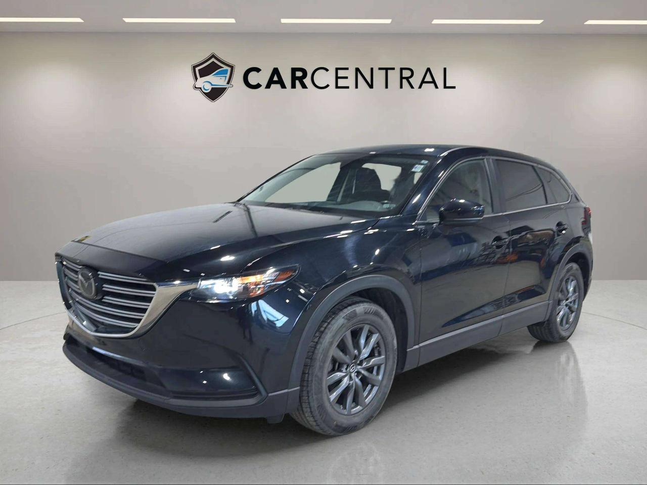 GS, 2.5L Turbo 4-Cylinder, 6-Speed Automatic, AWD, 7-Passenger Seating, Heated Front Seats, Heated Steering Wheel, 3-Zone Climate Control, 10.25" Display, Apple CarPlay, Android Auto, Bluetooth Connectivity, Mazda i-Activsense Safety, Adaptive Cruise Control, Lane Keep Assist, Blind Spot Monitoring, Rear View Camera.

The 2022 Mazda CX-9 GS is a midsize SUV powered by a 2.5L turbocharged 4-cylinder engine paired with a 6-speed automatic transmission and all-wheel drive, delivering strong, smooth performance with confident year-round capability. It offers a spacious three-row interior with seating for up to seven passengers, modern technology, and advanced safety features, making it a practical and comfortable choice for families and long-distance driving. Available now in Barrie.

CARFAX: Free Carfax report on all our listing. Just go on our website and click view Carfax report.


CERTIFICATION: Have your new pre-owned vehicle certified at Car Central! We offer a full safety inspection exceeding industry standards including oil change, and professional detailing prior to delivery. Vehicles are not drivable, if not certified and not e-tested, certification package is available for $749. All trade-ins are welcome. Taxes, licensing are extra.


PRICE: We believe everyone deserves to get the best price possible on their new pre-owned vehicle without having to go through uncomfortable negotiations. Our Market Value Pricing (MVP) allows you to buy with confidence. We do this by constantly monitoring the market and adjusting our prices below the market average you can buy confidently knowing you are getting the best price possible! No haggle pricing. No pressure. Why pay more somewhere else. **CASH PRICE** will be an additional $1750 and it will include 1 Year or 15,000 kms Powertrain warranty. 


SERVICE: Schedule an appointment with Car Central Service Centre to bring your vehicle in for all its needs. Simply click on the link below and book your appointment. Our licensed technicians and repair facility offer the highest quality services at the most competitive prices. All work is manufacturer warranty approved and comes with 2-year parts and labour warranty. Start saving hundreds of dollars by servicing your vehicle with Car Central. Call us at 705-503-5000 or follow this link to book an appointment today! https://www.carcentral.ca/contact-us/


WARRANTY: This vehicle qualifies for an extended warranty with different terms and coverages available. Dont forget to ask for help choosing the right one for you.


FINANCING: No credit? New to the country? Bankruptcy? Consumer proposal? Collections? You dont need good credit to finance a vehicle. Bad credit is usually good enough. Give our finance and credit experts a chance to get you approved and start rebuilding credit today! On the spot financing, instant approvals, and no payments for 6 months is also available O.A.C!


Any vehicle stock number starting with Letter R are Previous daily Rental.


With over 30 years of experience, Car Central is a proud family-owned business and a trusted member of the UCDA. Our mission is to offer not only the best prices but also high-quality, reliable vehicles and an exceptional customer experience. We believe in making your car buying journey stress-free, with absolutely no pressurejust honest service you can rely on."