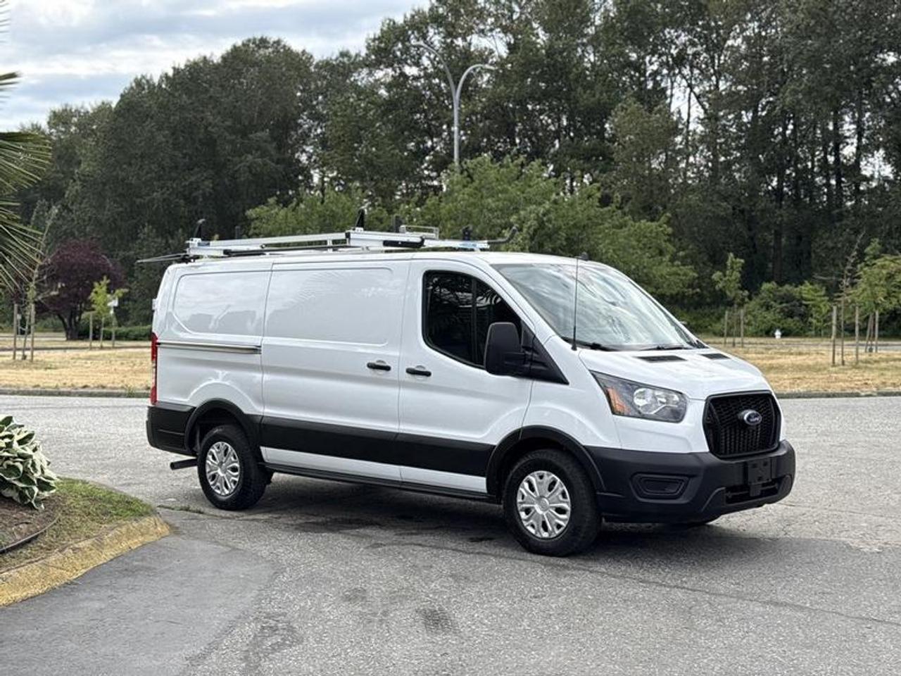 Used 2023 Ford Transit 150 Low Roof Cargo Van with Shelving and Roof Rack for sale in Burnaby, BC