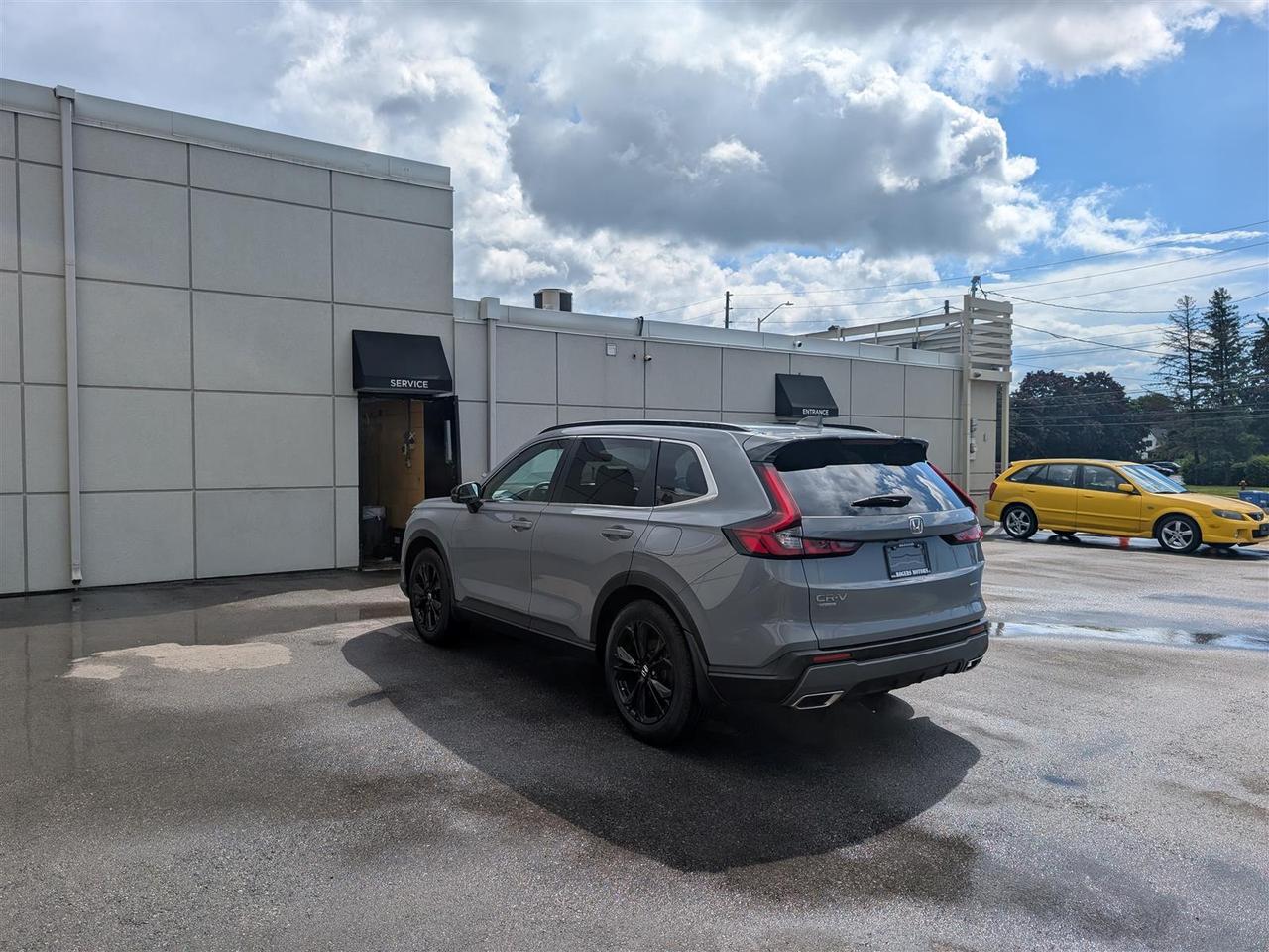 2025 Honda CR-V Hybrid TOURING AWD - NAVI - SUNROOF - LEATHER Photo
