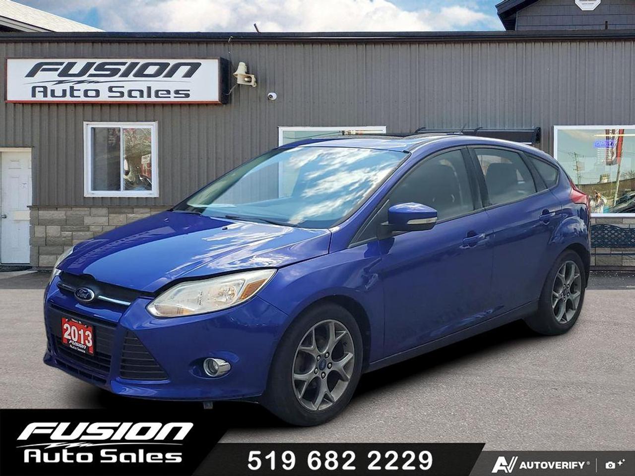 <p>Looking for a reliable and stylish ride that wont break the bank? Fusion Auto Sales has the perfect option for you: a <strong>2013 Ford Focus 5dr HB SE</strong> in a vibrant blue exterior and a sleek black leather interior. This compact sedan offers a fantastic blend of practicality and comfort, making it an ideal choice for navigating city streets or embarking on weekend adventures. With its dependable automatic transmission and front-wheel drive, youll experience a smooth and efficient drive every time you get behind the wheel. This particular Focus has seen 125,427 kilometers, a testament to its enduring performance and the care it has received.</p><p>Step inside this 2013 Ford Focus and youll immediately appreciate the refined feel of the black leather seats, offering both comfort and a touch of luxury for your daily commute. The practical hatchback design provides surprising versatility, allowing you to easily load and unload groceries, sports equipment, or luggage with ease. Under the hood, youll find a fuel-efficient V4 engine that&rsquo;s ready to take you wherever you need to go, offering the flexibility of Flex Fuel capability for added convenience at the pump. At Fusion Auto Sales, we pride ourselves on offering quality pre-owned vehicles that are ready for their next chapter.</p><p>Here are five features that truly make this 2013 Ford Focus 5dr HB SE shine:</p><ul><li><strong>Luxurious Black Leather Interior:</strong> Experience premium comfort and a touch of sophistication on every drive with these stylish and durable leather seats.</li><li><strong>Versatile 5-Door Hatchback Design:</strong> Enjoy effortless cargo access and flexible space, perfect for fitting in all your gear and essentials.</li><li><strong>Smooth Automatic Transmission:</strong> Glide through your commute with ease thanks to the seamless and convenient automatic gearbox.</li><li><strong>Fuel-Efficient V4 Engine with Flex Fuel Capability:</strong> Get great mileage and enjoy the flexibility to choose your fuel, saving you money at the pump.</li><li><strong>Eye-Catching Blue Exterior:</strong> Turn heads with this vibrant and attractive blue finish that adds a pop of personality to your vehicle.</li></ul><p><strong><em>Powered by AutoIntelligence&trade;</em></strong></p><p>Vehicle information has been generated using artificial intelligence and is provided for informational purposes only. While efforts are made to ensure accuracy, please confirm all details directly with the dealer.</p><p>The Fusion Philosophy<br><br>At Fusion Auto Sales, we put more effort into buying our vehicles than we do trying to sell them. By constantly monitoring what other car lots are doing, we strive to be the lowest priced dealer in our market. We won&rsquo;t purchase a vehicle to &ldquo;fill a hole&rdquo;. We know that the vehicles on our lot are great value for the money and smart shoppers realize that also. Adhering to this philosophy makes it easy for our customers. If they find a vehicle on our lot that fulfills their needs and wants, they know that they&rsquo;re getting great value. <br><br>If we don&rsquo;t have what you&rsquo;re looking for, we can find it! Over 150 customers have saved thousands of dollars buy joining our&rdquo; locate club&rdquo;. People that know what they want and what they want to pay (within reason of course), get the vehicle of their dreams and enjoy huge savings. Contact us for details.<br><br><br><br>Fusion Auto Sales is in Tilbury, Ont. located between Windsor and London right off the 401. We are among 7 dealerships within a &frac12; kilometer distance which is great for out of town shoppers. We began satisfying customers in 2009 and have been doing so ever since. In 2012 Fusion was recognized as 1 of the 50 fastest growing companies in Canada. And then, in 2018, we were named one of the top 5 independent automobile dealerships in the country. <br><br>We specialize in late model vehicles at below than average pricing, everything is fully certified and every unit is Car Proof verified and is fully disclosed with every unit. We offer every type of financing from perfect credit at great rates to credit challenges with competitive rates. We also specialize in locating vehicles for customers, we cant have everything on the lot so if you do not see it and are having a hard time finding what you are looking for, let us know and we can find it for you. Fusion Auto Sales spans its customer base from Windsor all the way to Timmins, On and every where in between. Our philosophy is You are going to like the way we deal and everyone does, straight honest answers with no monkey business and no back and forth between sales and managers.</p>