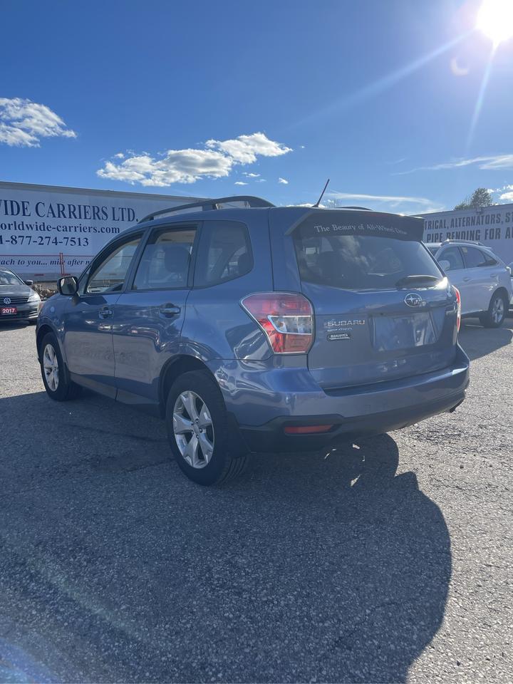 2015 Subaru Forester i Touring Photo3
