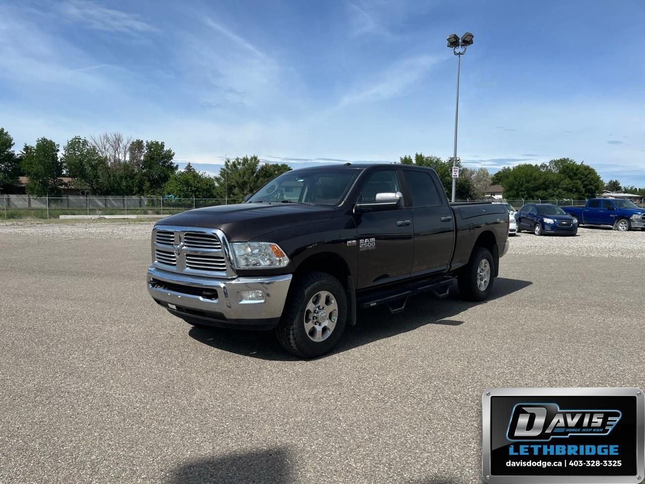 <b>Low Mileage, A/C, Remote Keyless Entry, SiriusXM, Chrome Trim!</b><br /> <br /> Get the job done in comfort and style in this extremely capable Ram 2500. This 2016 Ram 2500 is fresh on our lot in Lethbridge.<br /> <br />This Ram 2500 Heavy Duty delivers exactly what you need: superior capability and exceptional levels of comfort, all backed with proven reliability and durability. Whether you're in the commercial sector or looking at serious recreational towing and hauling, this Ram 2500 is ready for the job.<br /> <br />This low mileage Crew Cab 4X4 pickup has just 72,166 km. Stock number 41718 is Brown in colour. It has an Automatic transmission and is powered by a 410HP 6.4L 8 Cylinder Engine. It may have some remaining factory warranty, please check with dealer for details. <br /> <br /> Our 2500's trim level is SLT. Our Ram 2500 SLT offers a great blend of features and value. It comes with great features such as a Class V trailering package, chrome clad wheels, power windows, locks and mirrors, a sliding rear window, chrome bumpers and front grille, SiriusXM radio, air conditioning, remote keyless entry plus much more. This vehicle has been upgraded with the following features: A/C, Remote Keyless Entry, SiriusXM, Chrome Trim.<br /> <br />To apply right now for financing use this link: <a href=https://lethbridge.davisdodge.ca/free-credit-check/ target=_blank rel=nofollow noopener noreferrer>https://lethbridge.davisdodge.ca/free-credit-check/</a><br /> <br /><br />Locally Owned & Trusted for Over 35 Years  Davis Dodge in Lethbridge, AB <br /><br /> At Davis Dodge, weve proudly served the Lethbridge community for more than 35 years, offering an unparalleled car buying experience. Dont just take our word for itour Google reviews speak volumes about our commitment to exceptional service. <br /><br /> Delivery & At-Home Test Drives: Convenient options to suit your lifestyle. <br /><br /> Flexible Financing for Everyone: Get the vehicle you need with financing solutions tailored to your situation. <br /><br /> Full Mechanical Inspections & Professional Cleaning: Every vehicle is thoroughly inspected and cleaned before it hits our lot.<br /><br /> We take all makes and models on trade and offer competitive pricing with inventory that changes daily. Whether you're shopping for a Chrysler, Dodge, Jeep, RAM, or FIAT, our AMVIC Licensed dealership makes it easy to browse, buy, and drive away.<br /><br /> Located in Lethbridge, AB, we proudly serve customers in Fort Macleod, Taber, Claresholm, and Coaldale. Shop online or visit us today to experience the best in sales, service, and selection. Standard bank rates apply; taxes are additional.<br /><br /> Vehicle pricing offer shown expires 2026-06-30. <br /> Come by and check out our fleet of 50+ used cars and trucks and 100+ new cars and trucks for sale in Lethbridge. o~o