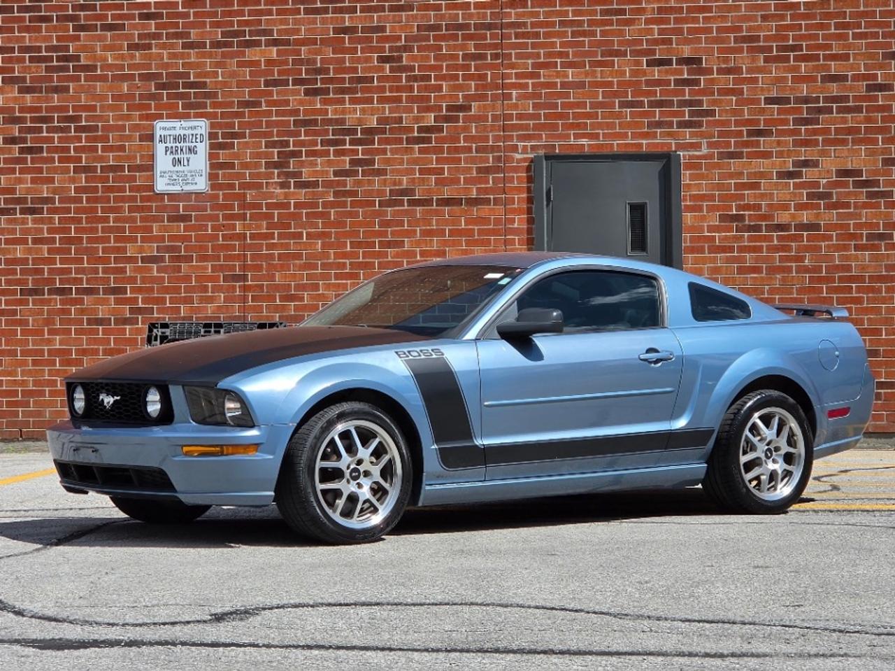 <p>THE LEGEND LIVES ON. This 2006 Ford Mustang GT is everything a true muscle car should be&nbsp;aggressive, powerful, and guaranteed to turn heads wherever it goes. </p><p><br></p><p>Powered by Fords legendary 4.6L V8 and paired to an automatic transmission, this American icon delivers the unmistakable rumble and performance that made Mustang a household name. Finished with upgraded SVT-style polished rims and striking Boss-inspired decals, this pony has a commanding road presence that perfectly captures the spirit of classic Mustang performance. The leather interior offers comfort while maintaining the raw muscle-car character enthusiasts crave. </p><p><br></p><p>Clean, well-kept, and loaded with attitude, this Mustang embodies the slogan that has defined generations: Built Ford Tough and Designed to be Driven. If youve been searching for an affordable V8 muscle car with timeless styling, incredible sound, and undeniable curb appeal, this pony is simply too clean to miss. Own the road. Unleash the legend. Grab this Mustang GT before it gallops away.</p><p><span id=jodit-selection_marker_1781902332016_6532430309535937 style=line-height: 0; display: none; data-jodit-selection_marker=start></span><br></p><p>{ CERTIFIED PRE-OWNED }<br><br>**THIS VEHICLE COMES FULLY CERTIFIED WITH A SAFETY CERTIFICATE & SERVICED AT NO EXTRA COST**<br><br>COLISEUM AUTO SALES ON WESTON <br>301 WESTON ROAD <br>TORONTO, ON M6N 3P1 <br>4 1 6 - 7 6 6 - 2 2 7 7<br></p>