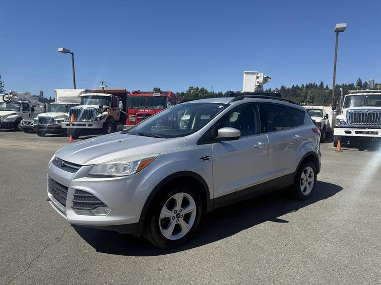2014 Ford Escape SE 4WD, 1.6L, 4 cylinder, 4 door, automatic, 4WD, 4-Wheel ABS, cruise control, AM/FM radio, power door locks, power windows, silver exterior, grey interior, cloth, (This listing is a former government asset)  $11,970.00 plus $375 processing fee, $12,345.00 total payment obligation before taxes.   Listing report, warranty, contract commitment cancellation fee, financing available on approved credit (some limitations and exceptions may apply). All above specifications and information is considered to be accurate but is not guaranteed and no opinion or advice is given as to whether this item should be purchased. We do not allow test drives due to theft, fraud, acts of vandalism and undetectable impaired driving. Instead we provide the following benefits: Complimentary Warranty (with options to extend), Limited Money Back Satisfaction Guarantee on Fully Completed Contracts, Contract Commitment Cancellation, and an Open-Ended Sell-Back Option. Ask seller for details or call 604-522-REPO(7376) to confirm listing availability.