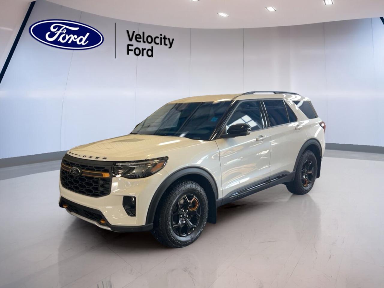 Built for drivers who want real capability with everyday comfort, the brand new 2026 Ford Explorer Tremor 4WD is ready for life in Moose Jaw. Its White exterior and Black interior give this SUV a clean, modern look. With four doors, automatic transmission, and a 2.3-litre unleaded engine, it delivers confident power for workdays, weekends, and changing prairie weather.

Sold by Velocity Ford, this new 2026 Ford Explorer Tremor 4WD blends rugged utility with the smart features many families and active drivers want most. Four-wheel drive helps you stay composed on rough roads and winter streets, while off-road tires, rear tow hook, and a limited slip differential add extra traction and control when the route gets less predictable.

FEATURES OF THE Explorer Tremor 4WD

»» Four-wheel drive for year-round driving confidence
»» Off-road tires support rougher terrain travel
»» Rear tow hook adds practical recovery help
»» Limited slip differential boosts traction off-road

ADVANCED SAFETY FEATURES

»» Backup camera helps with safer reversing
»» Lane departure warning supports highway awareness
»» Blind spot monitor aids lane changes
»» Side and head airbags add protection

PERFORMANCE AND EFFICIENCY

»» 2.3-litre unleaded engine delivers solid response
»» Automatic transmission supports smooth daily driving
»» Four-wheel drive improves grip in all seasons
»» Power steering helps easy low-speed manoeuvres

COMFORT AND CONVENIENCE

»» Heated front and rear seats add comfort
»» Dual-zone climate control helps balance temperatures
»» Power liftgate supports easier cargo access
»» Remote starter adds convenience in cold weather

TECHNOLOGY AND CONNECTIVITY

»» Navigation system helps guide every trip
»» Bluetooth integration supports hands-free communication
»» WiFi hotspot keeps devices better connected
»» Steering wheel audio controls simplify use

CARGO SPACE

»» Four-door layout helps loading passengers easily
»» Rear cargo area suits daily gear
»» Power liftgate helps with busy routines
»» Flexible SUV space supports weekend travel

WHAT OTHER OWNERS LIKE

»» Confident four-wheel drive in poor weather
»» Comfortable heated seats for Canadian winters
»» Useful technology for daily family driving
»» Strong balance of utility and comfort

This SUV also includes many sought-after features that make daily driving easier. Cruise control helps on long highway runs, while power windows, heated mirrors, and electric mirrors add simple convenience. Front air conditioning, rear climate control, rear air conditioning, and automatic climate control help keep the cabin pleasant in every season.

Inside, the cabin is designed for comfort and ease of use. A leather steering wheel, adjustable steering wheel, ambient lighting package, drivers seat lumbar support, lumbar support passenger seat, drivers side power seat, and electric passenger seat all help create a more relaxed drive. Heated rear seats are a welcome touch for passengers during cold Saskatchewan mornings.

This new 2026 Ford Explorer Tremor 4WD also brings practical technology to every trip. Satellite radio, HD Radio, LED headlamps, automatic headlights, push button start, and a backup camera support both convenience and visibility. Tire pressure monitoring, stability control, anti-lock braking system, child safety locks, and multiple airbags help round out a well-equipped and family-friendly SUV.

This 2026 Ford Explorer Tremor 4WDs VIN is: 1FMUK8JH7TGC09368.