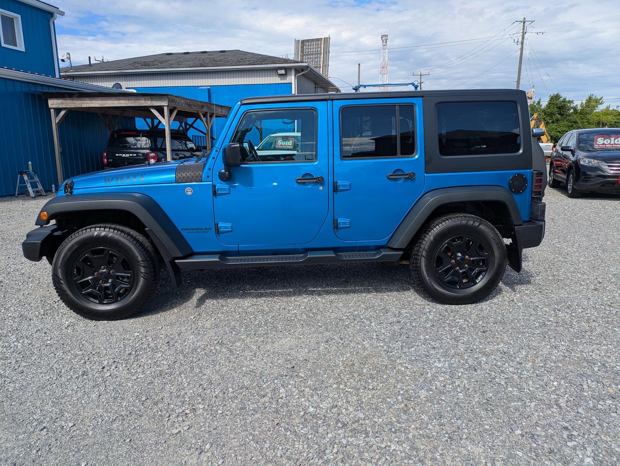 2016 Jeep Wrangler 4WD 4dr Willys Wheeler Photo1