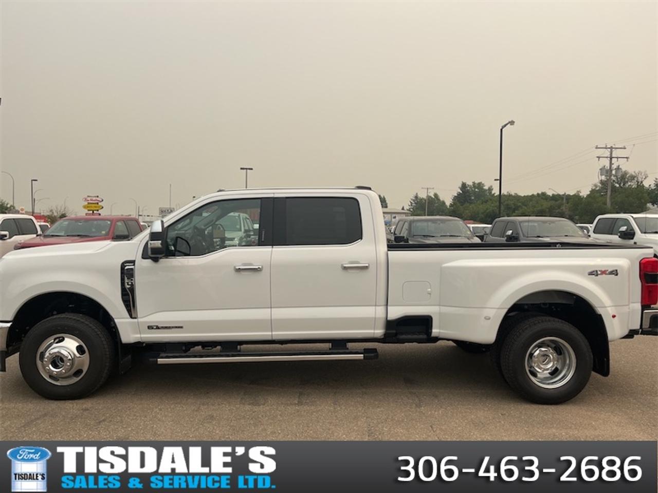 <b>Spray-in Bedliner!</b><br> <br> Check out the large selection of new Fords at Tisdales today!<br> <br>This Ford Super Duty is the toughest, most capable pickup truck that Ford has ever built, and thats saying a lot.<br> <br>The most capable truck for work or play, this heavy-duty Ford F-350 never stops moving forward and gives you the power you need, the features you want, and the style you crave! With high-strength, military-grade aluminum construction, this F-350 Super Duty cuts the weight without sacrificing toughness. The interior design is first class, with simple to read text, easy to push buttons and plenty of outward visibility. This truck is strong, extremely comfortable and ready for anything.<br> <br>This Oxford White sought after diesel Crew Cab 4X4 pickup has an Automatic transmission and is powered by a 475HP 6.7L 8 Cylinder Engine. <br> <br> Our F-350 Super Dutys trim level is Lariat. Experience rugged capability and luxury in this F-350 Lariat trim, which features leather-trimmed heated and ventilated front seats with power adjustment, memory function and lumbar support, a heated leather-wrapped steering wheel, voice-activated dual-zone automatic climate control, power-adjustable pedals, a sonorous 8-speaker Bang & Olufsen audio system, and two 120-volt AC power outlets. This truck is also ready to get busy, with equipment such as class V towing equipment with a hitch, trailer wiring harness, a brake controller and trailer sway control, beefy suspension with heavy duty shock absorbers, power extendable trailer style mirrors, and LED headlights with front fog lamps and automatic high beams. Connectivity is handled by a 12-inch infotainment screen powered by SYNC 4, bundled with Apple CarPlay, Android Auto, inbuilt navigation, and SiriusXM satellite radio. Safety features also include a surround camera system, pre-collision assist with automatic emergency braking and cross-traffic alert, blind spot detection, rear parking sensors, forward collision mitigation, and a cargo bed camera. This vehicle has been upgraded with the following features: Spray-in Bedliner.<br><br> View the original window sticker for this vehicle with this url <b><a href=http://www.windowsticker.forddirect.com/windowsticker.pdf?vin=1FT8W3DT8TEE92193 target=_blank>http://www.windowsticker.forddirect.com/windowsticker.pdf?vin=1FT8W3DT8TEE92193</a></b>.<br> <br>To apply right now for financing use this link: <a href=http://www.tisdales.com/shopping-tools/apply-for-credit.html target=_blank>http://www.tisdales.com/shopping-tools/apply-for-credit.html</a><br> <br/>Total rebate of $8000 is reflected in the price. Incentives expire 2026-07-31. See dealer for details. <br><br>Tisdales is not your standard dealership. Sales consultants are available to discuss what vehicle would best suit the customer and their lifestyle, and if a certain vehicle isnt readily available on the lot, one will be brought in. o~o