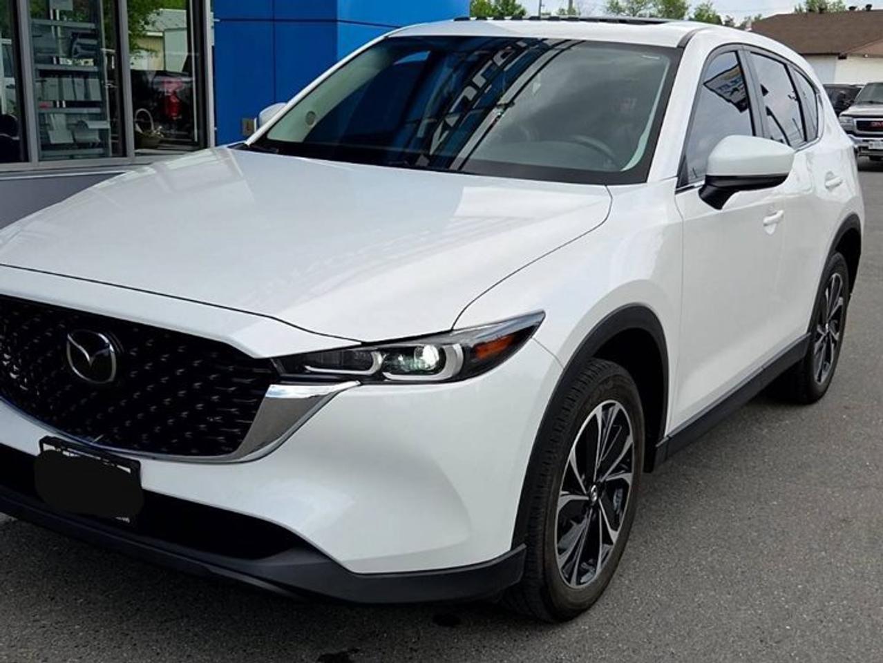 Come see this certified 2023 Mazda CX-5 GS AWD | Sunroof | Split Leather | Heated Seats + Steering | CarPlay | Power Liftgate | and More !. Its Automatic transmission and 2.5 L engine will keep you going. This Mazda CX-5 features the following options: Sunroof, Reverse Camera, Heated Steering Wheel, Apple Car Play, Air Conditioning, Adaptive Cruise, Heated Seats, Tilt Steering Wheel, Steering Radio Controls, and Power Windows. Test drive this vehicle at Mark Wilsons Better Used Cars, 5055 Whitelaw Road, Guelph, ON N1H 6J4.MASSIVE SELECTION: 500+ vehicles in ONE LOCATION, all Live Market Priced for the best value!STRAIGHTFORWARD & TRANSPARENT PRICING: Our Advertised Price INCLUDES:Safety Certification! (No separate certification fee upcharge).FREE Carfax History Report!NO upcharge for paying cash!CONFIDENCE & PEACE OF MIND: 30-Day/3,000 km Warranty INCLUDED! Plus a 5-Day Exchange Privilege!*EASY FINANCING: Better-than-bank rates, $0 Down, and 3 Months No Payments available OAC. BAD CREDIT APPROVED HERE!WE BUY CARS: Get Top Dollar for your trade, or sell us your vehicle for CASH even if you dont buy ours!www.shopwilsons.comAn Honest, Transparent Buying Experience. Trusted in business since 1961!(Cash Prices Exclude HST and Licensing Fees only.)