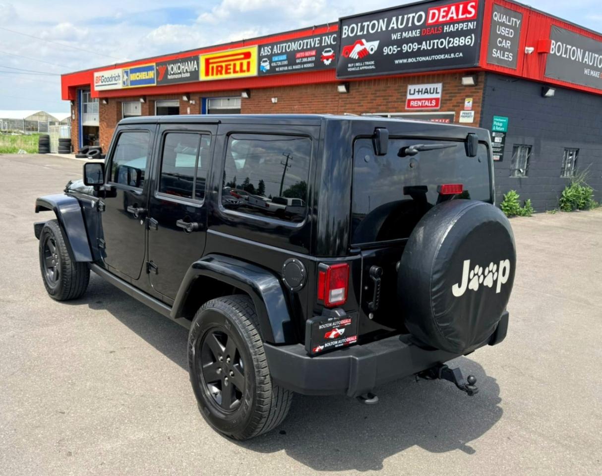 2015 Jeep Wrangler Unlimited Sahara X Photo