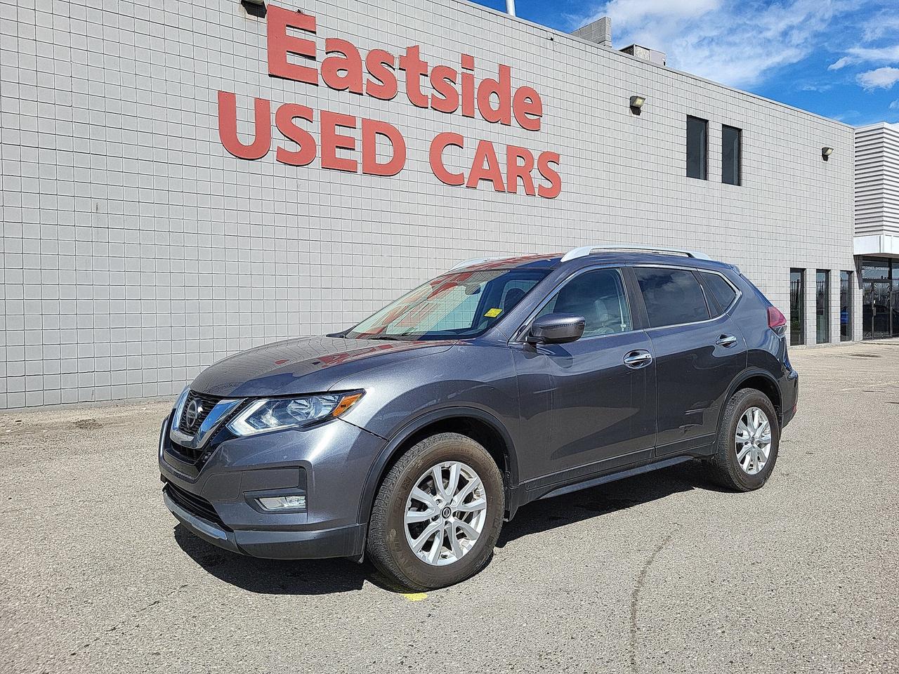 This previously enjoyed 2018 Nissan Rogue is part of Nissans 4WD Sport Utility Vehicles segment and a very nice ride! It has a 4 cylinder engine and&nbspVariable transmission. This&nbspRogue came into our Pre-Owned inventory with  174452 kilometers and in good condition. The color is a nice Gray and aside from the wear and tear of a previously enjoyed vehicle, it is a very nice Rogue!!

 Dont forget to explore the options tab for more details. If youre satisfied with what youve learned thus far, kindly fill out one of the forms on this page. One of our proficient and extensively trained sales representatives will provide you with a product demonstration, a personalized video walk-through, and of course, details on pricing and financing options.  

  We know we are not the only Pre-Owned dealer in Calgary, but we pride ourselves on being one of the busiest in town. With over 150 units in our Pre-Owned inventory and being one of Canadas TOP 5 Dodge Chrysler Jeep Ram dealers, we are confident that we have exactly what you are looking for! 

   Thank you for considering purchasing this  2018 Nissan RogueAt Eastside Dodge, we are thrilled to offer you an exceptional experience. We pledge to ensure that it surpasses all your expectations and becomes one of your finest experiences.