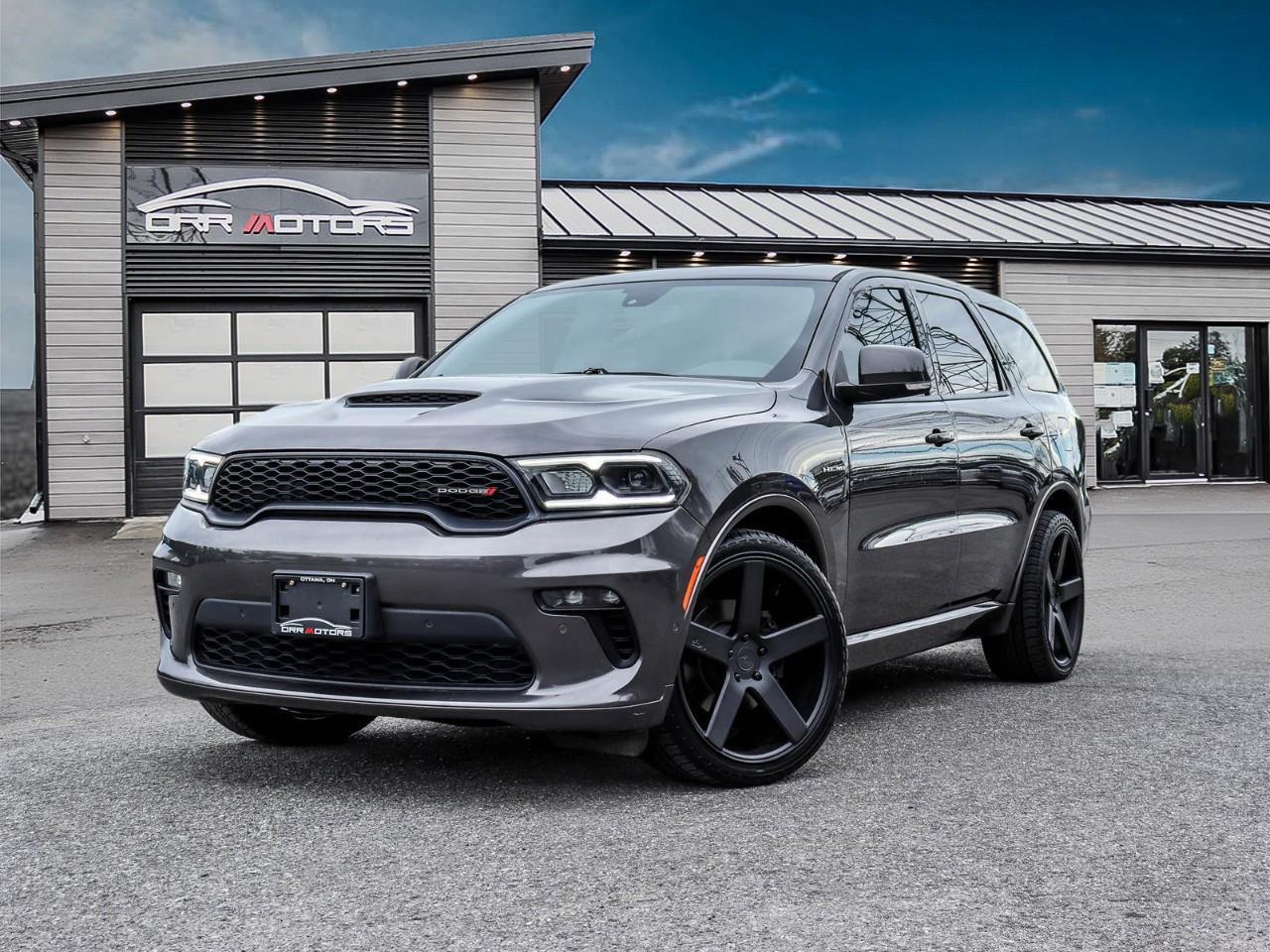 <p>2021 Dodge Durango R/T AWD — Performance 3-Row SUV for Sale in Ottawa, ON</p><p>Available now at Orr Motors - The Trusted Used Car Dealer in Ottawa Since 1962.</p><p>If you're looking for a used performance SUV in Ottawa that can seat seven and still pull a trailer, the 2021 Dodge Durango R/T AWD is hard to beat. Combining HEMI V8 muscle, all-season AWD, and genuine three-row versatility, this pre-owned Durango delivers everything families across Kanata, Stittsville, and Ottawa's west end expect from an R/T badge.</p><p>Under the hood sits Dodge's legendary 5.7L HEMI V8 producing 360 horsepower and 390 lb-ft of torque, paired with an 8-speed TorqueFlite automatic transmission and permanent all-wheel drive. The result is confident, immediate power whether you're merging onto the Queensway or heading north for the weekend. Experience the power, precision, and excitement of true performance. Contact Orr Motors today to schedule your test drive.</p><p><strong>Key Features:</strong> - 5.7L HEMI V8 Engine (360 hp / 390 lb-ft) - 8-Speed TorqueFlite Automatic Transmission - All-Wheel Drive (AWD) - 10.1" Uconnect 5 Touchscreen with Apple CarPlay & Android Auto - Alpine 9-Speaker Premium Audio System - Heated Front & Rear Seats - 7-Passenger Seating - Remote Start - Power Liftgate - Dual-Zone Automatic Climate Control - Blind Spot Monitoring with Rear Cross-Path Detection - ParkSense Rear Park Assist - 20" Painted Aluminum Wheels</p><p><strong>Fuel Economy (L/100 km):</strong> City: 16.7 · Highway: 10.9 · Combined: 14.1</p><p><strong>Additional Highlights:</strong> Fully Certified & Safety Inspected Financing Available for All Credit Types Extended Warranty Options Available</p><p><strong>Why Buy from Orr Motors Ottawa:</strong> Family-Owned & Operated Dealership Since 1962 Certified & Safety-Inspected Vehicles Competitive Financing Options for All Credit Types Extended Warranty Coverage Available Serving Ottawa, Kanata, Stittsville & Nepean</p><p>Visit us at Orr Motors — 6230 Hazeldean Rd, Ottawa</p><p>Call: 613-836-3333 | orrmotors.com</p> <br /> <br /> <br /> **Advertised price is for finance purchase. <br /> *Every reasonable effort is made to ensure the accuracy of the information listed above. Vehicle pricing, incentives, options (including standard equipment), and technical specifications listed is for the Year, Make and Model of the vehicle, and may not match the exact vehicle displayed. Please confirm with a sales representative the accuracy of this information.