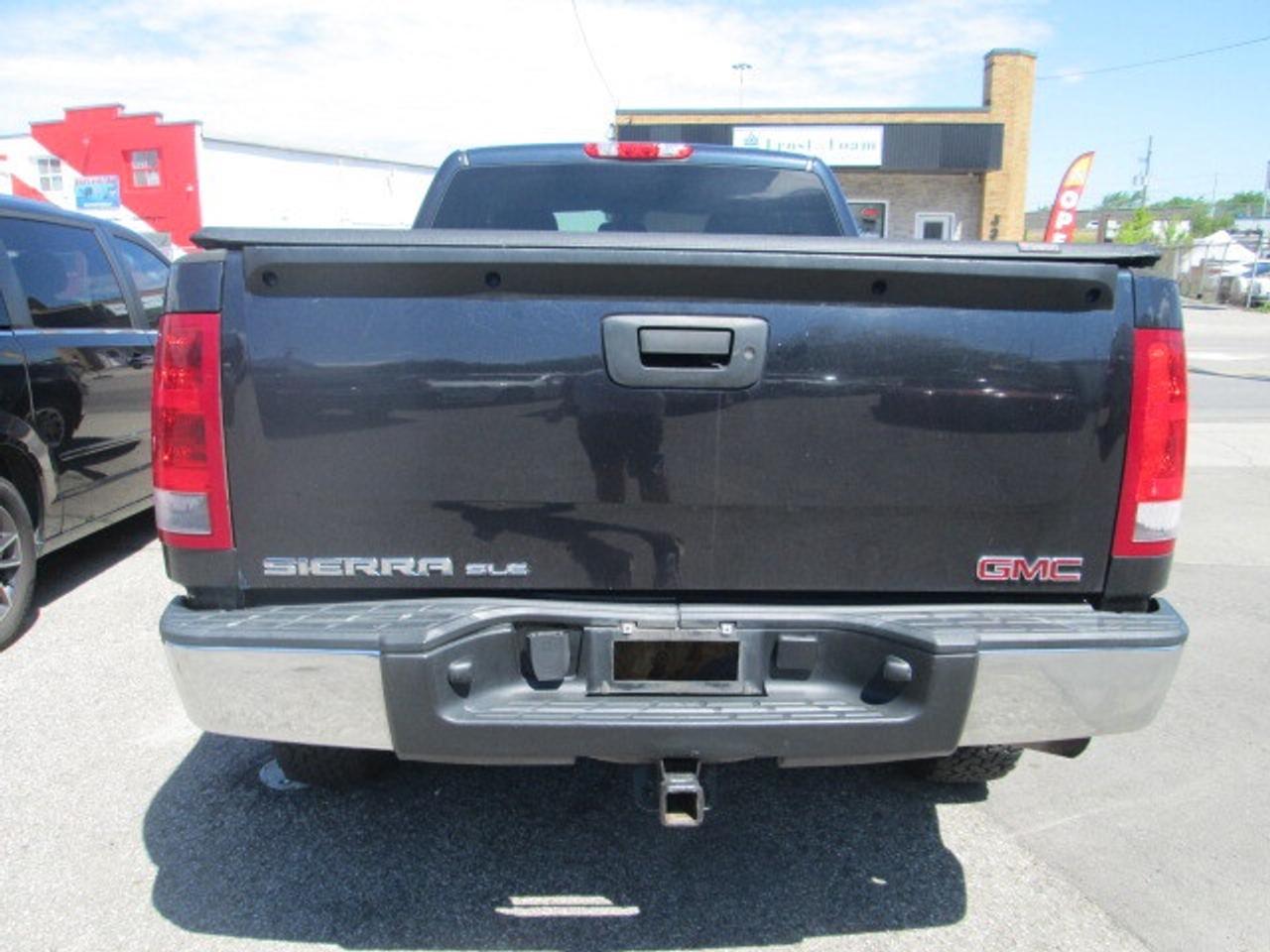 2013 GMC Sierra 1500 4WD Ext Cab 143.5  SLE, Side Steps, Cover, Liner Photo