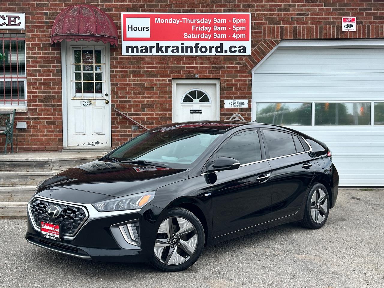 <p>WOW! Super-Clean local One-Owner Hyundai Ioniq Hybrid from Oshawa, ON! This Ultimate Hatchback model looks incredible in its Black paint and factory alloy wheels, with great options inside and out! The exterior features keyless entry with proximity keys, automatic headlights, a large factory power sunroof, colour-matched side mirrors with integrated turn signals, tinted privacy glass, forward collision warning/adaptive cruise settings, blind spot monitors, lane departure warning, rear parking sensors, gorgeous factory dark alloy wheels, a peppy and fuel-efficient 1.6L 4-cylinder Engine with Hybrid Electric system and Automatic transmission! The interior is clean and comfortable with heated leather seating for front and rear occupants, power adjustable drivers seating with lumbar control and memory settings, power door locks, windows and mirrors, a large cargo area with retractable cargo cover, comfortable rear seating, a heated leather wrapped steering wheel with Audio and Cruise controls, an easy to read gauge display, push button start, a large central touch screen AM/FM/XM Satellite HD Radio with <em>Harman/Kardon</em> Premium Audio, Bluetooth, Navigation, Apple CarPlay, Android Auto, Vehicle Information Displays, and Backup Camera, Dual-Zone A/C climate controls with front and rear window defrost settings, USB/12V accessory ports and more!</p><p>&nbsp;</p><p>Carfax Claims Free, Local One-Owner, Sharp Hatchback Hybrid with Great Options and Fuel Economy!</p><p><strong>Our price includes safety certification, NO ADMIN FEES!</strong></p><p>Call (905) 623-2906</p><p>&nbsp;</p><p>Text Ryan: (905) 429-9680 or email: ryan@markrainford.ca</p><p>&nbsp;</p><p>Text Mark: (905) 431-0966 or email: mark@markrainford.ca</p>
