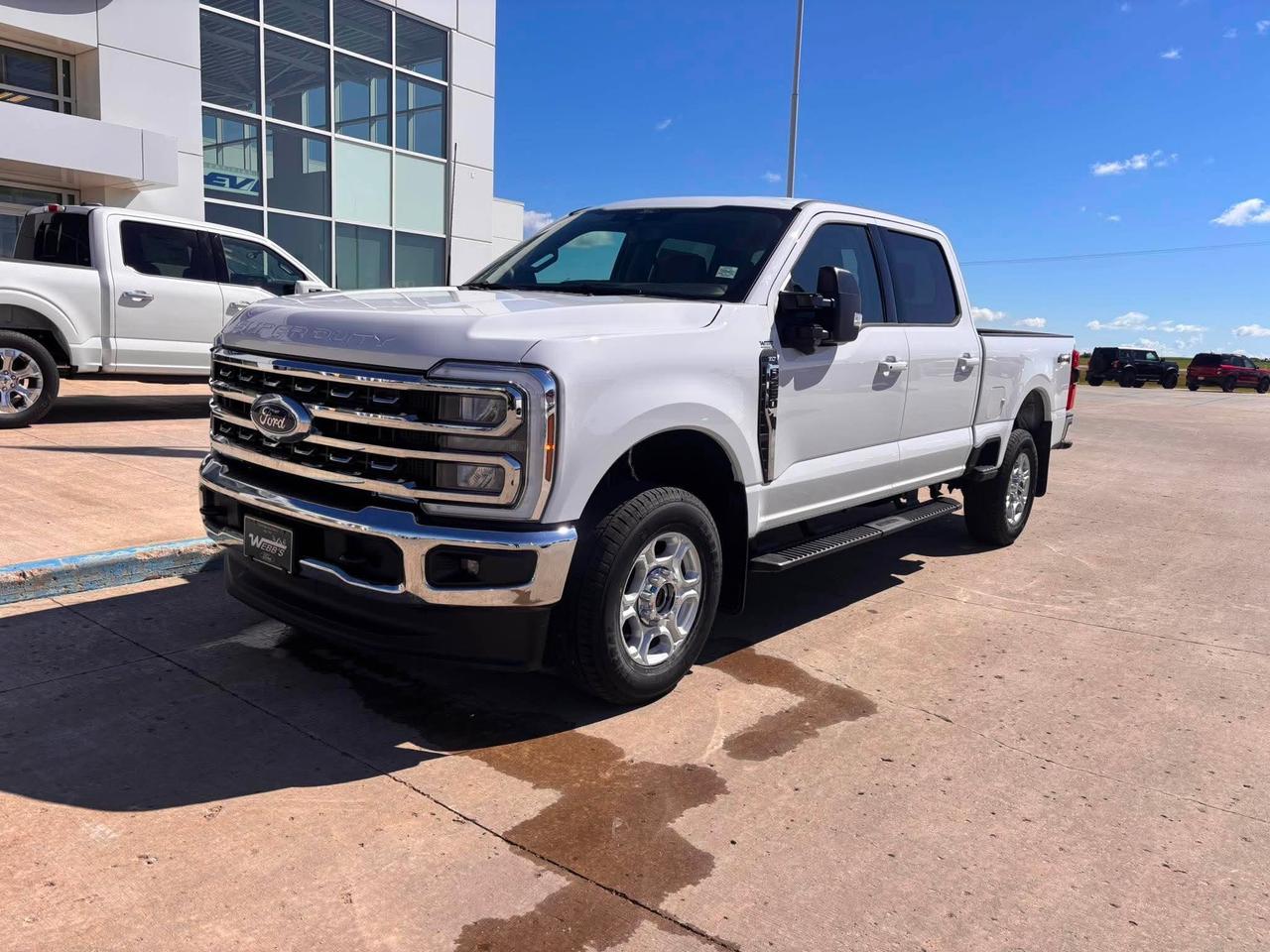 <p>Get ready to conquer any task with the brand new 2026 Ford F-250 Super Duty SRW XLT 4WD Crew Cab, now available at Webbs 1441. This isnt just a truck; its a powerhouse engineered for serious work and rugged adventure. Whether youre hauling heavy loads, towing your toys, or navigating challenging terrain, this F-250 is built to perform. Its commanding presence and robust construction are matched by a refined interior designed for comfort and functionality, making every drive, from the job site to the weekend getaway, an exceptional experience.</p><p>&nbsp;</p><p>Under the hood, the formidable 6.8L V8 gasoline engine, paired with the smooth-shifting TorqShift-G 10-speed automatic transmission, delivers the muscle you need for demanding jobs. The 4WD system, coupled with an electronic-locking rear axle and a 3.73 gear ratio, ensures confident traction in any condition. Inside, the XLT trim offers a comfortable and practical cabin, featuring a versatile cloth 40/20/40 split bench seat and the XLT Premium Package, which enhances both convenience and style.</p><p>&nbsp;</p><p>Here are five features that truly make this 2026 Ford F-250 Super Duty stand out:</p><p><br><br></p><ul><li><strong>Powerful 6.8L V8 Gasoline Engine:</strong> Unleash uncompromising power and torque for all your heavy-duty hauling and towing needs.</li></ul><p>&nbsp;</p><ul><li><strong>TorqShift-G 10-Speed Automatic Transmission:</strong> Experience seamless gear changes and optimized performance for both work and highway cruising.</li></ul><p>&nbsp;</p><ul><li><strong>Electronic-Locking Rear Axle with 3.73 Ratio:</strong> Gain superior traction and control when you need it most, tackling tough jobs and off-road challenges with confidence.</li></ul><p>&nbsp;</p><ul><li><strong>XLT Premium Package:</strong> Elevate your driving experience with enhanced features that add convenience, comfort, and a touch of sophistication to your Super Duty.</li></ul><p>&nbsp;</p><ul><li><strong>Tailgate Step & Handle:</strong> Make loading and accessing your truck bed easier and safer than ever before, streamlining your workflow.</li></ul><p><br><br></p><p><strong><em>Powered by AutoIntelligence&trade;</em></strong></p><p>&nbsp;</p><p>Powered by AutoIntelligence&trade;</p><p>&nbsp;</p>