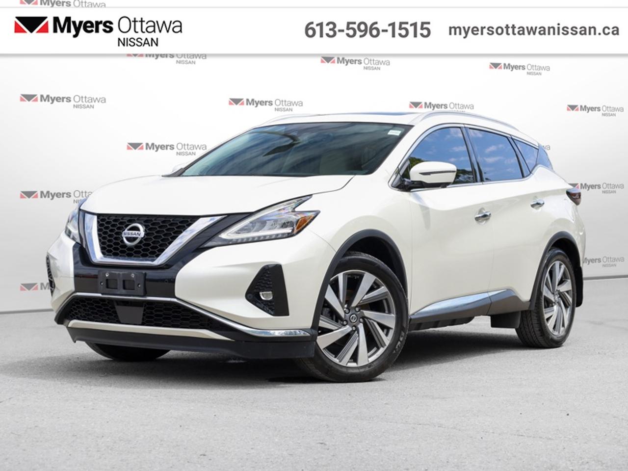 <b>Navigation, Driver Assistance, Sunroof, Hands Free Liftgate, Heated Seats, Android Auto, Apple CarPlay</b><br> <br>  Compare at $26995 - Our Price is just $24595! <br> <br>This Nissan Murano features an eye-catching design, a plush cabin, and high-tech standard features. This 2021 Nissan Murano is for sale today in Ottawa.<br> <br>Ever since its debut in the early 2000s, the Nissan Murano has staked out a claim between premium and nonpremium SUVs with its refined ride, standout styling, well-appointed interior, and feature-laden spec sheet. This 2021 example is still playing that value game, with a plethora of standard technology features and a spacious, welcoming interior. This Muranos serene ride and impressive dynamics make it an ideal road-trip companion.<br> <br>This SUV has 68,349 km. Its White in colour and is completely accident free based on the <a href=https://vhr.carfax.ca/?id=eWkjRKMggWnexQODTzd3NZyCErdRTN9a target=_blank>CARFAX Report</a>. It has an Automatic transmission and is powered by a 260HP 3.5L V6 Cylinder Engine. <br> <br> Our Muranos trim level is AWD SL. This Murano SL has all the adaptive and active safety features you could ever want, like intelligent assistance with cruise control with adaptive speed, driver alertness, blind spot intervention, moving object detection, and emergency braking with collision warning. This is matched to a luxuriously comfortable interior power sunroof, adjustable interior ambient lighting, hands free power liftgate, remote start, Advanced Drive Assist, text assistant, Around View Monitor 360 degree camera, dual zone automatic climate control, Nissan Intelligent Key with push button start and keyless entry, remote front window roll down, leather wrapped heated steering wheel with audio and cruise control, leather seats, and heated power front seats. Keeping you connected is an 8 inch touchscreen with voice recognition, navigation, Android Auto and Apple CarPlay compatibility, SiriusXM, Bluetooth, and a Bose premium sound system.<br> <br>To apply right now for financing use this link: <a href=https://www.myersottawanissan.ca/finance target=_blank>https://www.myersottawanissan.ca/finance</a><br> <br/>Payments from <b>$395.59</b> monthly with $0 down for 84 months @ 8.99% APR O.A.C. ( Plus applicable taxes - and licensing fees ). See dealer for details. <br><br>Get the amazing benefits of a Nissan Certified Pre-Owned vehicle!!! Save thousands of dollars and get a pre-owned vehicle that has factory warranty, 24 hour roadside assistance and rates as low as 2.99%!!! <br>*LIFETIME ENGINE TRANSMISSION WARRANTY NOT AVAILABLE ON VEHICLES WITH KMS EXCEEDING 140,000KM, VEHICLES 8 YEARS & OLDER, OR HIGHLINE BRAND VEHICLE(eg. BMW, INFINITI. CADILLAC, LEXUS...)<br> Come by and check out our fleet of 30+ used cars and trucks and 140+ new cars and trucks for sale in Ottawa.  o~o