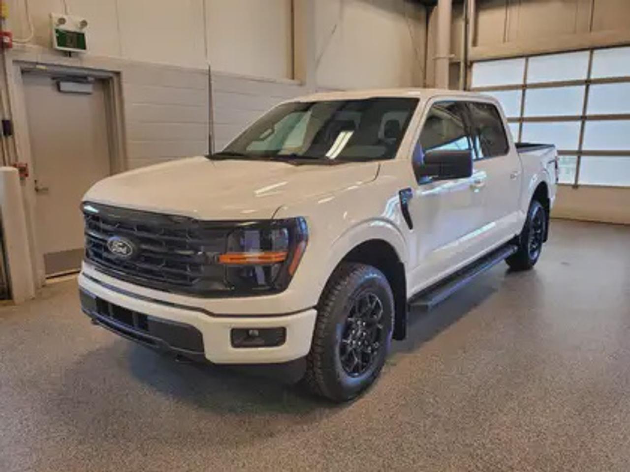 This all-new, full-sized 2026 Ford F-150 XLT  301A is a showstopper in Oxford White. This pickup is equipped with the 2.7L EcoBoost engine, producing 325 horsepower and 400 lb-ft of torque. Paired with a 10-speed automatic transmission, this truck achieves a combined fuel economy of 11.8L/100km (24 miles per gallon), making it both powerful and efficient. 

Key Features:
12 LCD Captivity Touchscreen
Electronic Power-Assist Steering
Dual-Zone Electronic Auto Temp Control
Cruise Control
Power Windows
AdvanceTrac® With Roll Stability Control
Perimeter Alarm
Ford Co-Pilot360
Lane Keeping System
Rear View Camera
Rear Parking Sensors
Reverse Park Assist
Class IV Trailer Hitch
Power Drivers Seat
Remote Start
SYNC®4
Apple Car Play
18 All Terrain Tires
Bluetooth Connectivity
XLT Black Appearance Package
Engine Block Heater
Trailer Brake Control

Moose Jaw Ford, conveniently located at 1010 North Service Road in Moose Jaw, is your trusted destination for all your automotive needs. With an impressive 4.8-star Google rating from nearly 1,500 reviews, we are proud to deliver an exceptional vehicle-buying experience tailored just for you. Our Moose Jaw Motives set us apart, offering unbeatable value like half-priced oil changes for life on pre-owned vehicles, one year of key and remote protection, and one year of tire and rim protection. Enjoy peace of mind with every purchase. At Moose Jaw Ford, were committed to driving positive change in our community by combining exceptional service, high-quality vehicles, and a guest-first approach. Visit us today!