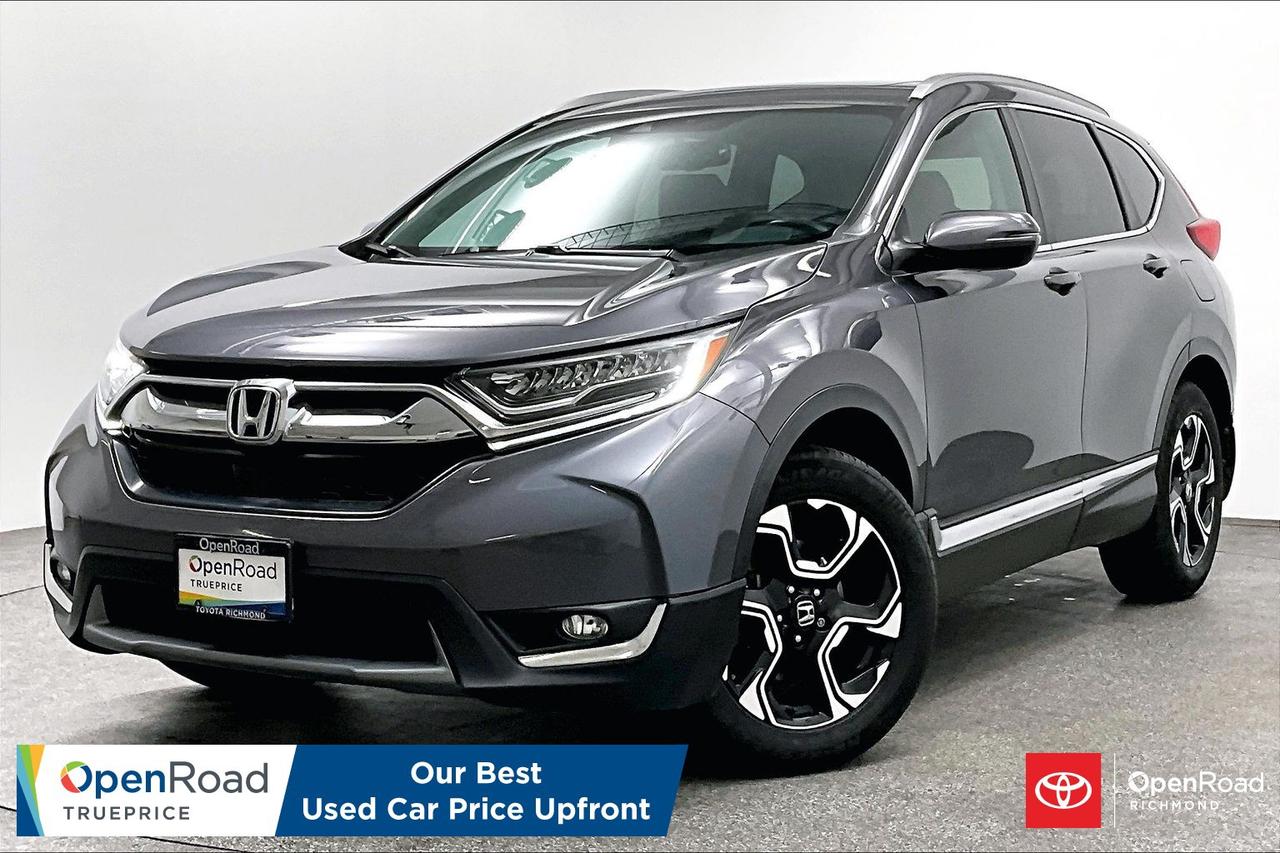 Fully loaded with every high-end option available, this gorgeous 2019 Honda CR-V Touring AWD is the perfect match. Powered by a responsive 1.5L turbocharged 4-cylinder engine and a seamless CVT automatic transmission, it delivers an energetic 190 horsepower while maintaining incredible, class-leading fuel economy. As the absolute top-of-the-line Touring trim, the premium cabin is an oasis of comfort, featuring full perforated leather seating, heated front and rear seats, a heated leather-wrapped steering wheel, factory navigation, and a massive panoramic moonroof that brightens the entire vehicle. This premium family commuter comes packed with elite, sought-after conveniences including a hands-free power tailgate (kick-to-open), brilliant full-LED headlights, rain-sensing wipers, and an upgraded 331-watt premium audio system with a factory subwoofer. Complete with the full Honda Sensing safety suite&mdash;featuring Adaptive Cruise Control, Lane Keeping Assist, and Blind Spot Information with Rear Cross-Traffic Monitor&mdash;alongside a robust Real-Time AWD system for confident winter driving, this highly dependable, clean-title SUV is fully inspected and ready for the road&mdash;message today to book a viewing!   Buying a used car should be simple and stressfree  no guesswork, no negotiations  just the vehicles true price. Thats why were introducing OpenRoad TruePrice, a new way to buy used vehicles. One Price. TruePrice. Our best price upfront. At Openroad Toyota RIchmond, we offer the best used car warranty in Metro Vancouver. Our used car warranty program includes 30 days or 2,000 kilometres Exchange Privilege, 90 Day Powertrain Coverage*, Mechanical & Safety Check of up to 210 Points and a clean title.    *90 Powertrain coverage will be offered at the discretion of management based on a case by case scenario."