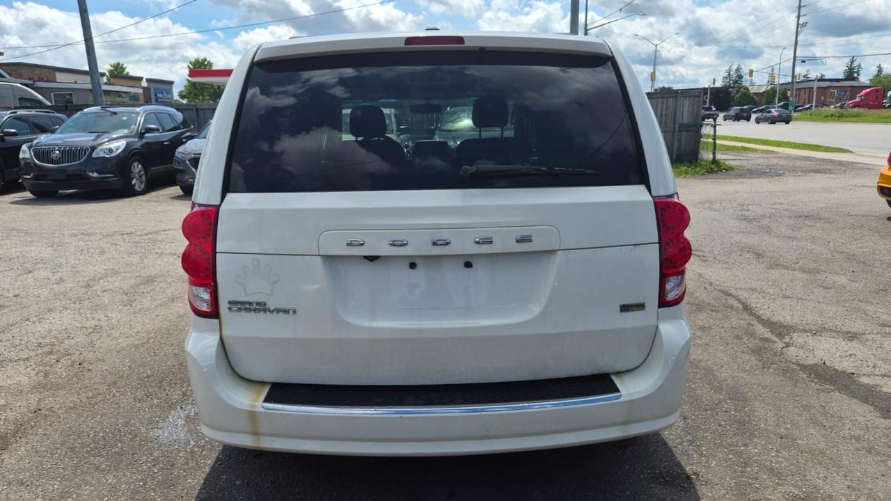 2012 Dodge Grand Caravan AS IS, SXT, RUNS AND DRIVES WELL, STOW N GO Photo
