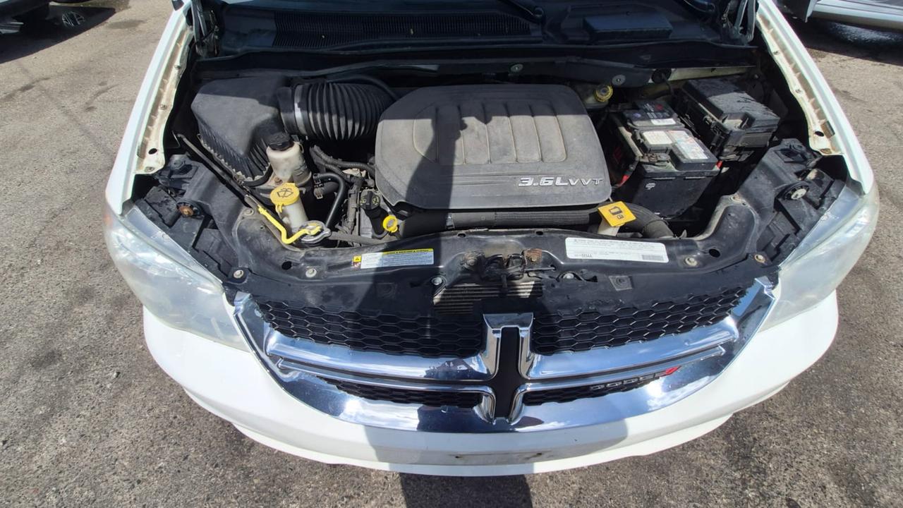 2012 Dodge Grand Caravan AS IS, SXT, RUNS AND DRIVES WELL, STOW N GO Photo