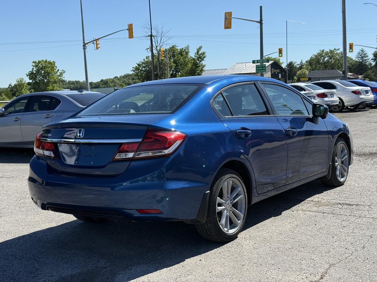 2015 Honda Civic 4dr Auto EX Photo2
