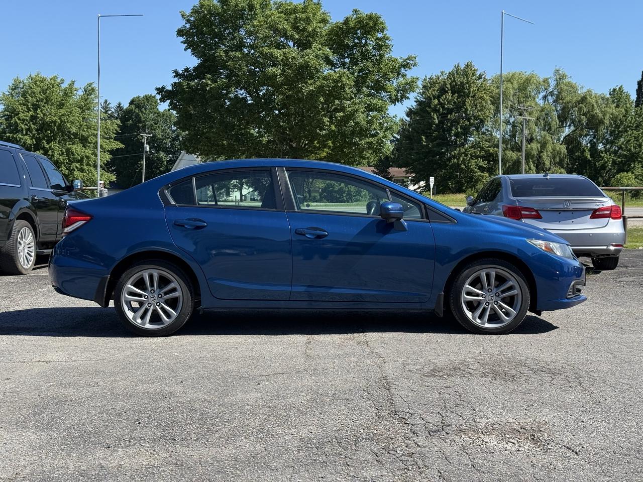 2015 Honda Civic 4dr Auto EX Photo