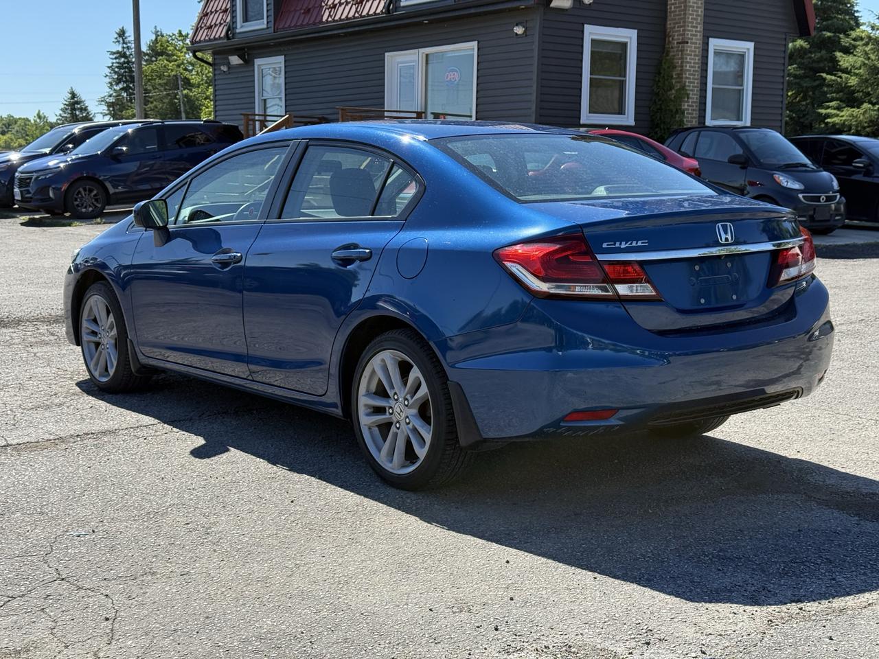 2015 Honda Civic 4dr Auto EX Photo