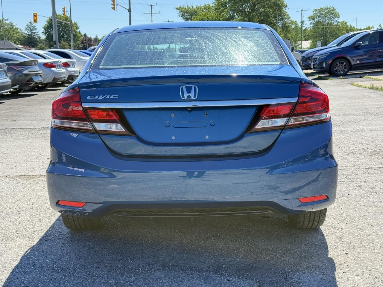 2015 Honda Civic 4dr Auto EX Photo3