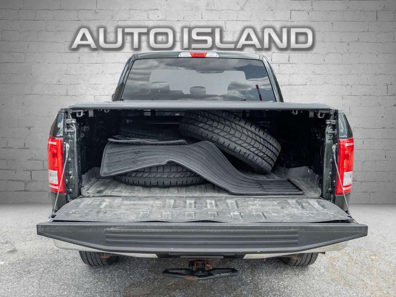 2016 Ford F-150 4WD SuperCab 145 Lariat Photo