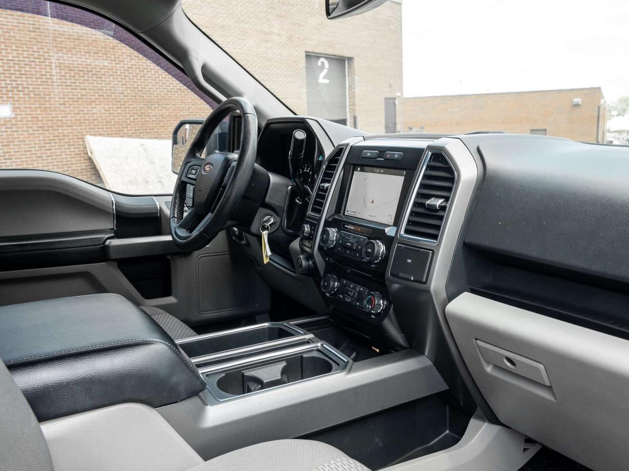 2016 Ford F-150 4WD SuperCab 145 Lariat Photo
