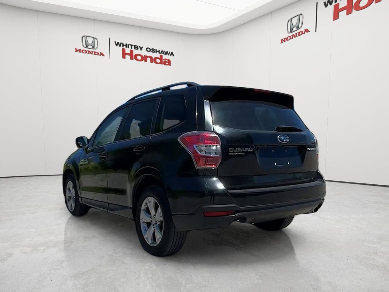 2015 Subaru Forester 5dr Wgn CVT 2.5i Touring Photo