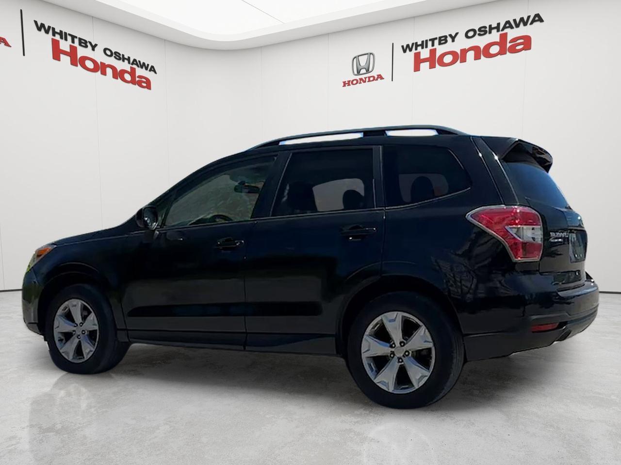 2015 Subaru Forester 5dr Wgn CVT 2.5i Touring Photo