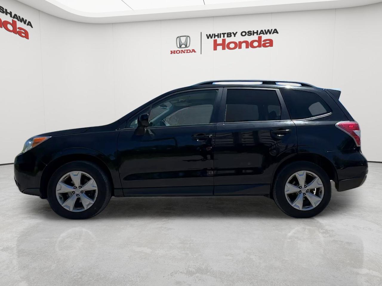 2015 Subaru Forester 5dr Wgn CVT 2.5i Touring Photo2