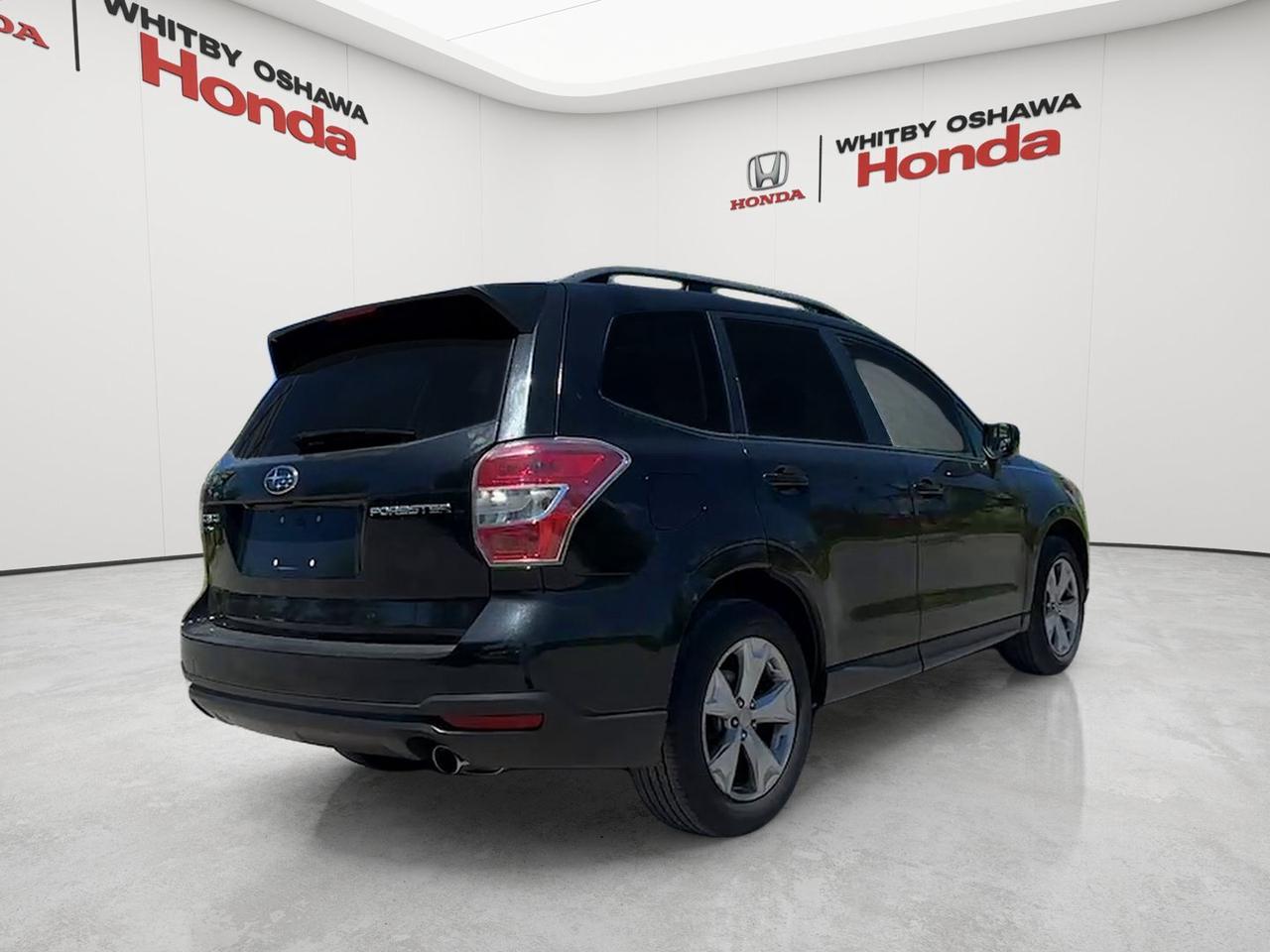 2015 Subaru Forester 5dr Wgn CVT 2.5i Touring Photo