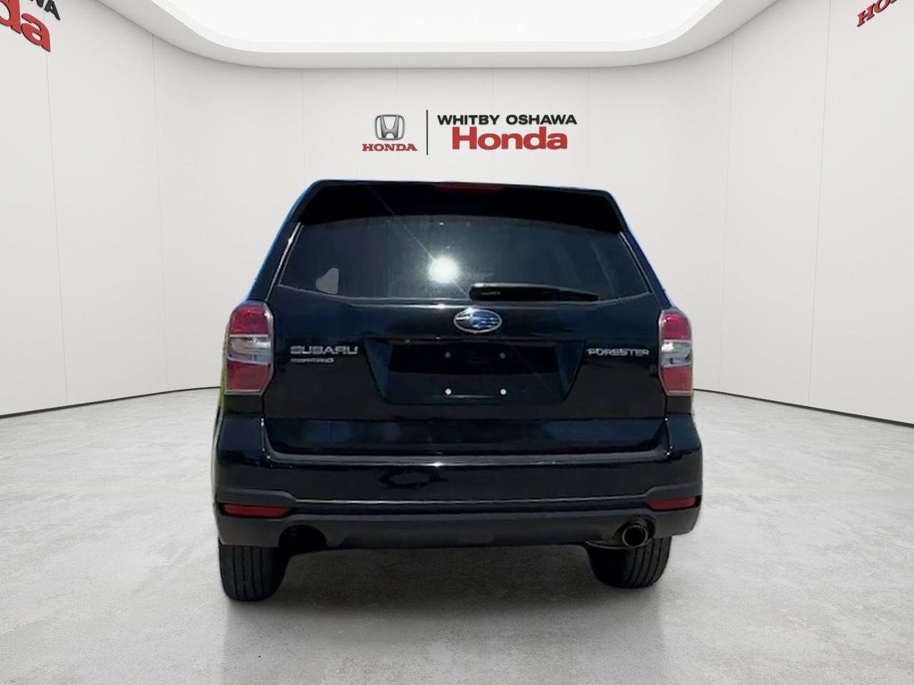 2015 Subaru Forester 5dr Wgn CVT 2.5i Touring Photo