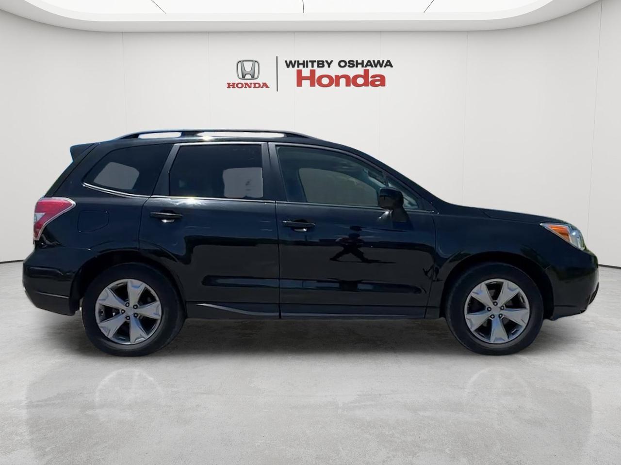 2015 Subaru Forester 5dr Wgn CVT 2.5i Touring Photo