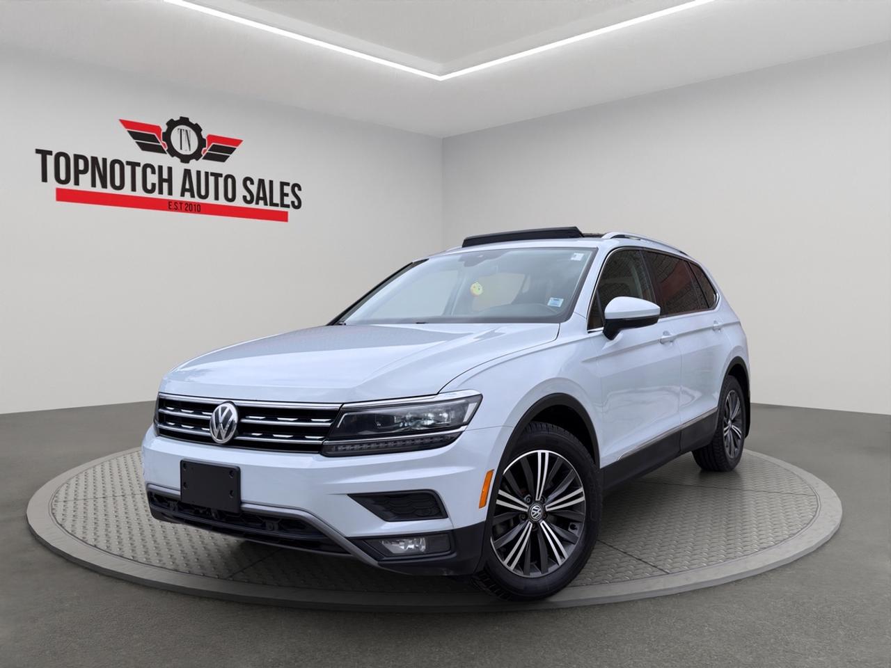 <h3><strong>2018 Volkswagen Tiguan </strong></h3><p><strong>Now Available at Topnotch Auto Sales Inc</strong></p><p>Discover the perfect combination of versatility, modern technology, and European engineering with the 2018 Volkswagen Tiguan, now available at Topnotch Auto Sales Inc. This stylish compact SUV offers a refined driving experience, spacious interior, and advanced safety featuresmaking it an excellent choice for families, daily commuters, or anyone seeking comfort and practicality in a well-rounded vehicle.</p><p>With its sleek exterior design, elevated driving position, and thoughtfully crafted interior, the Tiguan stands out as a smart and sophisticated option in todays competitive SUV market.</p><p><br></p><h3><strong>Performance & Driving Experience</strong></h3><p>Under the hood, the 2018 Tiguan is powered by a turbocharged engine paired with a smooth automatic transmission, delivering an ideal balance of efficiency and performance. Its responsive handling, stable ride quality, and confident acceleration make it equally capable on city roads and highways.</p><p>Volkswagens precision engineering ensures a comfortable, quiet, and composed drive every time you get behind the wheel.</p><p><br></p><h3><strong>Spacious Interior & Comfort Features</strong></h3><p>Step into a well-designed cabin that prioritizes comfort and functionality. The 2018 Tiguan offers generous space for passengers and cargo, making it perfect for both everyday use and long-distance travel.</p><p><strong>Interior Highlights:</strong></p><ul><li>Comfortable seating for up to five passengers</li><li>Heated front seats for added comfort in colder weather</li><li>Power-adjustable drivers seat</li><li>Dual-zone climate control for personalized comfort</li><li>Foldable rear seats for expanded cargo capacity</li><li>High-quality materials and clean, modern design</li></ul><h3><strong>Technology & Connectivity</strong></h3><p>Stay connected and entertained with a suite of intuitive technology features designed for convenience and ease of use.</p><p><strong>Technology Features:</strong></p><ul><li>Rearview backup camera for easier parking</li><li>Bluetooth hands-free calling and audio streaming</li><li>Touchscreen infotainment system</li><li>USB and auxiliary input connectivity</li><li>Steering wheel-mounted controls</li><li>Smartphone integration capabilities</li></ul><h3><strong>Safety & Reliability</strong></h3><p>Drive with confidence knowing the 2018 Volkswagen Tiguan is equipped with essential safety features designed to protect you and your passengers.</p><p><strong>Safety Highlights:</strong></p><ul><li>Backup camera for improved visibility</li><li>Electronic stability control and traction control</li><li>Anti-lock braking system (ABS)</li><li>Multiple airbags throughout the cabin</li><li>Tire pressure monitoring system</li></ul><h3><strong>Excellent Condition</strong></h3><p>This Tiguan has been well maintained and is in clean condition inside and out. Fully inspected and professionally detailed, its ready for its next owner.</p><p><br></p><h3><strong>Why Choose Topnotch Auto Sales Inc?</strong></h3><p>With over 14 years of experience, Topnotch Auto Sales Inc is committed to providing high-quality pre-owned vehicles and exceptional customer service. We offer a transparent and hassle-free buying experience to ensure your complete satisfaction.</p><p><br></p><h3><strong>Flexible Financing Options</strong></h3><p>We work with all types of credit:</p><ul><li>Fast approvals</li><li>Same-day financing available</li><li>Low down payment options</li></ul><h3><strong>Certification Available</strong></h3><p>For only <strong>$799</strong>, you can have this vehicle certified to meet all Ontario safety standardsadding extra confidence and value to your purchase.</p><p><br></p><h3><strong>OMVIC Notice</strong></h3><p>As per OMVIC regulations, this vehicle is being sold <strong>asis</strong> unless certified. Our team is happy to assist you with certification and answer any questions.</p><p><br></p><p> <strong>Visit Us:</strong></p><p>5455 Steeles Ave W, North York, ON M9L 1S7</p><p> <strong>Call or Text:</strong></p><p>416-879-7113</p>