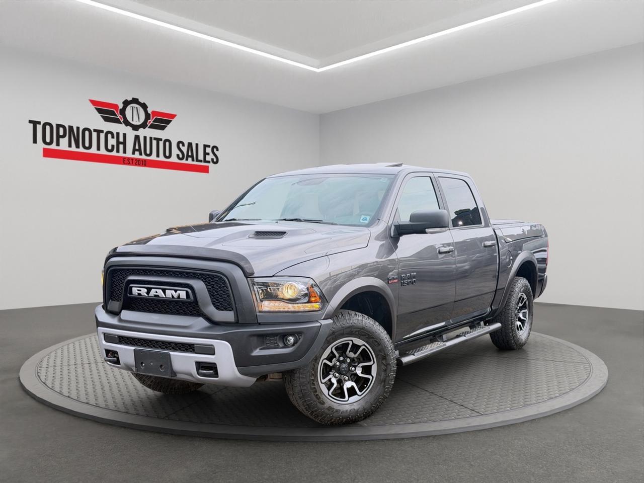 <h2>2017 Ram 1500</h2><h3>Now Available at Topnotch Auto Sales Inc</h3><p>Experience legendary capability, rugged durability, and everyday comfort with the 2017 Ram 1500. Built to handle demanding workloads while delivering a refined driving experience, this full-size pickup truck offers the perfect combination of power, practicality, and comfort. Whether you need a dependable work truck, a capable towing vehicle, or a versatile daily driver, the Ram 1500 is engineered to exceed expectations.</p><p><br></p><h2>Performance & Capability</h2><p>The 2017 Ram 1500 delivers strong performance and confident capability with its powerful engine lineup and smooth automatic transmission. Designed for hauling, towing, and everyday driving alike, the Ram provides impressive ride comfort thanks to its refined suspension system and responsive handling. Whether youre on the highway, at the job site, or exploring off-road terrain, this truck is built to perform.</p><h3>Performance Highlights:</h3><ul><li>Powerful and reliable engine performance</li><li>Smooth-shifting automatic transmission</li><li>Impressive towing and hauling capability</li><li>Stable highway driving and comfortable ride quality</li><li>Durable body-on-frame construction built for tough jobs</li></ul><p>The 2017 Ram 1500 is known for strong towing capability, available V8 HEMI performance, and a comfortable cabin that stands out in the full-size truck segment.</p><p><br></p><h2>Interior Comfort & Features</h2><p>Step inside and discover a spacious cabin designed with comfort and convenience in mind. The Ram 1500 offers supportive seating, user-friendly controls, and smart storage solutions that make every drive more enjoyable.</p><h3>Interior Highlights:</h3><ul><li>Spacious seating for passengers and crew</li><li>Premium cloth seating surfaces</li><li>Power windows, locks, and mirrors</li><li>Large center console and storage compartments</li><li>Foldable rear seating for added cargo flexibility</li><li>Quiet and refined cabin design</li></ul><h2>Technology & Connectivity</h2><p>Stay connected and entertained with practical technology features designed to enhance your driving experience.</p><h3>Technology Features:</h3><ul><li>Bluetooth hands-free calling and audio streaming</li><li>AM/FM audio system with USB and auxiliary inputs</li><li>Steering-wheel-mounted controls</li><li>Available touchscreen infotainment system</li><li>Rearview backup camera for added convenience</li></ul><h2>Safety & Peace of Mind</h2><p>The 2017 Ram 1500 is equipped with advanced safety and stability technologies to help keep you and your passengers protected on the road.</p><h3>Safety Highlights:</h3><ul><li>Anti-lock braking system (ABS)</li><li>Electronic stability control and traction control</li><li>Multiple airbags throughout the cabin</li><li>Tire pressure monitoring system</li><li>Rearview camera for improved visibility</li><li>Strong frame construction for added protection</li></ul><p>Standard safety systems including stability control, traction control, ABS, and multiple airbags were widely available across Ram 1500 trims.</p><p><br></p><h2>Vehicle Condition</h2><p>This 2017 Ram 1500 has been exceptionally well maintained and professionally detailed inside and out. Thoroughly inspected and ready for its next owner, this truck is prepared to deliver years of dependable service.</p><p><strong>Stock #: HS700818</strong></p><p><strong>VIN #: 1C6RR7YT5HS700818</strong></p><h2>Why Choose Topnotch Auto Sales Inc?</h2><p>With over 14 years of automotive industry expertise, Topnotch Auto Sales Inc is dedicated to providing quality pre-owned vehicles along with exceptional customer service. Our team is committed to helping you find the right vehicle with a smooth and stress-free buying experience.</p><p><br></p><h2>Flexible Financing Solutions</h2><p>No matter your credit historygood credit, bad credit, or rebuilding creditour finance specialists are here to help.</p><p> Fast and easy approvals</p><p> Same-day financing options</p><p> Competitive low down payment programs</p><h2>Certification Option</h2><p>Certification is available for $799 for added peace of mind. Our certification process ensures the vehicle meets Ontario safety standards for confident ownership.</p><p><br></p><h2>OMVIC Compliance Notice</h2><p>In accordance with OMVIC regulations, this vehicle is being sold asis unless certified. Our team will gladly explain the certification process and answer any questions you may have.</p><p><br></p><p> Visit Us At:</p><p>5455 Steeles Ave W, North York, ON M9L 1S7</p><p> Call or Text:</p><p>416-879-7113</p>
