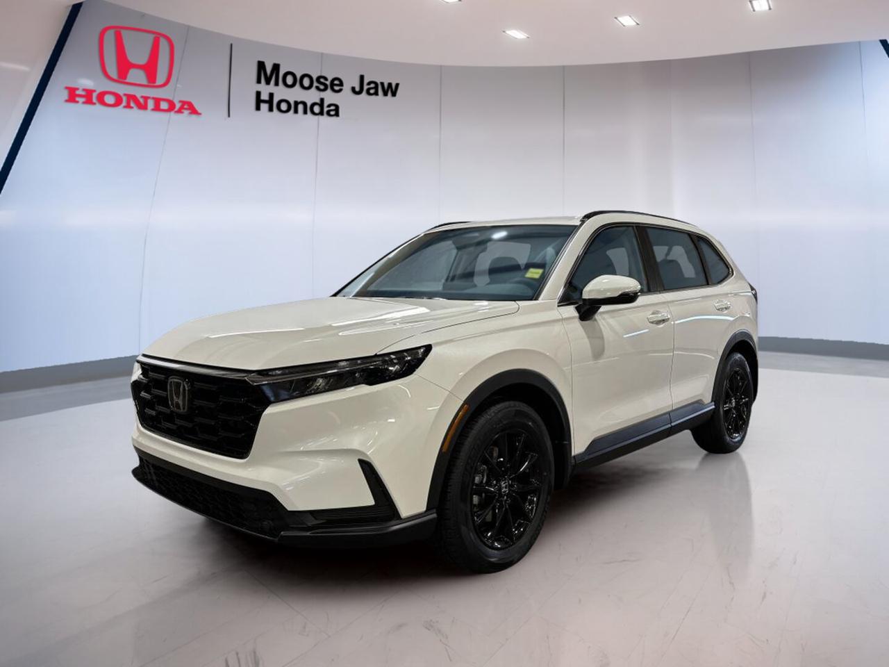 Discover the 2026 Honda CR-V Sport at Moose Jaw Honda in Moose Jaw. This brand new SUV blends everyday ease, smart utility, and confident all-weather capability. Finished in White with a Black interior, the 2026 Honda CR-V Sport brings a clean, modern look and the versatility many Canadian drivers want.

Built for busy weekdays and relaxed weekend travel, the 2026 Honda CR-V Sport offers a strong balance of comfort, efficiency, and control. Its 1.5L 16-valve DOHC turbocharged 4-cylinder engine works with a continuously variable transmission for smooth power delivery, while all-wheel drive helps support traction in changing road conditions.

FEATURES OF THE CR-V Sport

»» Sport styling with bold exterior details
»» Standard all-wheel drive for year-round confidence
»» Turbocharged power for smooth daily driving
»» Spacious cabin with versatile rear seating

ADVANCED SAFETY FEATURES

»» Advanced airbag system for occupant protection
»» Vehicle stability assist supports secure handling
»» Anti-lock braking system helps controlled stops
»» Traction control adds grip on slick roads

PERFORMANCE AND EFFICIENCY

»» 1.5L turbocharged four-cylinder engine delivers responsive power
»» Continuously variable transmission supports smooth acceleration
»» All-wheel drive adds confidence in weather
»» Turbo efficiency suits commuting and travel

COMFORT AND CONVENIENCE

»» Spacious cabin designed for everyday comfort
»» Four-door access makes entry and loading easy
»» Black interior offers a clean look
»» Flexible rear seating supports daily versatility

TECHNOLOGY AND CONNECTIVITY

»» Clear driver displays keep information visible
»» User-friendly controls support easy operation
»» Modern cabin layout feels intuitive
»» Smart design keeps essentials within reach

CARGO SPACE

»» Rear cargo area suits daily errands
»» Wide opening helps load larger items
»» Split rear seat expands carrying flexibility
»» SUV design supports practical family use

WHAT OTHER OWNERS LIKE

»» Comfortable ride quality for daily driving
»» Useful cargo room for busy lifestyles
»» Confident all-wheel drive in poor weather
»» Efficient turbo power for balanced performance

The 2026 Honda CR-V Sport is a smart choice for drivers who need one vehicle to do many jobs well. It feels easy to live with, simple to drive, and ready for Canadian roads. The elevated seating position also helps give a clear view ahead, which many SUV shoppers value.

Its White exterior brings a fresh and timeless finish that looks right at home in any season. Inside, the Black interior adds a neat, practical feel that pairs well with the CR-Vs sporty character. This combination gives the cabin a refined appearance without losing its family-friendly purpose.

For drivers in Moose Jaw who want a brand new SUV with proven Honda engineering, useful space, turbocharged performance, and all-wheel drive confidence, the 2026 Honda CR-V Sport deserves a close look. It is built to handle daily routines with ease while giving you the flexibility to take on more whenever needed.

This 2026 Honda CR-V Sports VIN is: 2HKRS4H54TH116236.<p>Discover the 2026 Honda CR-V Sport at Moose Jaw Honda in Moose Jaw. This brand new SUV blends everyday ease</p>
<p> modern look and the versatility many Canadian drivers want.

Built for busy weekdays and relaxed weekend travel</p>
<p> and control. Its 1.5L 16-valve DOHC turbocharged 4-cylinder engine works with a continuously variable transmission for smooth power delivery</p>
<p> while all-wheel drive helps support traction in changing road conditions.

FEATURES OF THE CR-V Sport

»» Sport styling with bold exterior details
»» Standard all-wheel drive for year-round confidence
»» Turbocharged power for smooth daily driving
»» Spacious cabin with versatile rear seating

ADVANCED SAFETY FEATURES

»» Advanced airbag system for occupant protection
»» Vehicle stability assist supports secure handling
»» Anti-lock braking system helps controlled stops
»» Traction control adds grip on slick roads

PERFORMANCE AND EFFICIENCY

»» 1.5L turbocharged four-cylinder engine delivers responsive power
»» Continuously variable transmission supports smooth acceleration
»» All-wheel drive adds confidence in weather
»» Turbo efficiency suits commuting and travel

COMFORT AND CONVENIENCE

»» Spacious cabin designed for everyday comfort
»» Four-door access makes entry and loading easy
»» Black interior offers a clean look
»» Flexible rear seating supports daily versatility

TECHNOLOGY AND CONNECTIVITY

»» Clear driver displays keep information visible
»» User-friendly controls support easy operation
»» Modern cabin layout feels intuitive
»» Smart design keeps essentials within reach

CARGO SPACE

»» Rear cargo area suits daily errands
»» Wide opening helps load larger items
»» Split rear seat expands carrying flexibility
»» SUV design supports practical family use

WHAT OTHER OWNERS LIKE

»» Comfortable ride quality for daily driving
»» Useful cargo room for busy lifestyles
»» Confident all-wheel drive in poor weather
»» Efficient turbo power for balanced performance

The 2026 Honda CR-V Sport is a smart choice for drivers who need one vehicle to do many jobs well. It feels easy to live with</p>
<p> which many SUV shoppers value.

Its White exterior brings a fresh and timeless finish that looks right at home in any season. Inside</p>
<p> practical feel that pairs well with the CR-Vs sporty character. This combination gives the cabin a refined appearance without losing its family-friendly purpose.

For drivers in Moose Jaw who want a brand new SUV with proven Honda engineering</p>
<p> the 2026 Honda CR-V Sport deserves a close look. It is built to handle daily routines with ease while giving you the flexibility to take on more whenever needed.

This 2026 Honda CR-V Sports VIN is: 2HKRS4H54TH116236.</p>