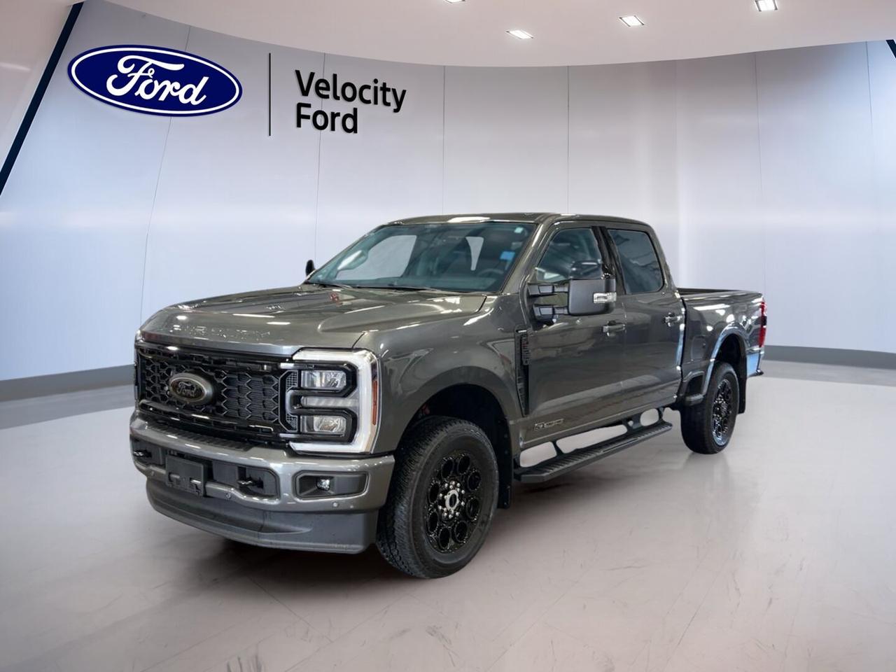 Brand new and ready for hard work, this 2026 Ford Super Duty F-350 SRW LARIAT 4WD Crew Cab 6.75 Box with Ultimate & FX4 Pkg is built for serious capability in Moose Jaw. Finished in Grey with a Black interior, this four-door heavy-duty truck pairs a 6.7-litre diesel engine with an automatic transmission for confident strength, refined comfort, and dependable everyday utility.

With four-wheel drive, a 6,349 kg towing capacity, and a well-equipped LARIAT trim, this new Ford truck is made to handle demanding jobs and long highway pulls with ease. It also brings smart driver aids, premium cabin touches, and useful connectivity features that help make every drive more productive and more comfortable.

FEATURES OF THE Super Duty F-350 SRW LARIAT 4WD Crew Cab 6.75 Box With Ultimate & FX4 Pkg
»» LARIAT trim with Ultimate package upgrades
»» FX4 package for off-road confidence
»» Crew Cab with 6.75-foot box
»» 6.7-litre diesel power and four-wheel drive

TRUCK FEATURES
»» Tows up to 6,349 kilograms confidently
»» Short box supports cargo flexibility
»» Rear tow hook aids recovery tasks
»» Four-wheel drive helps on rough surfaces

ADVANCED SAFETY FEATURES
»» Anti-lock braking for controlled stopping
»» Stability control helps maintain traction
»» Blind spot monitor boosts lane awareness
»» Backup camera assists while reversing

PERFORMANCE AND EFFICIENCY
»» 6.7-litre diesel engine delivers strong torque
»» Automatic transmission supports smooth power delivery
»» Limited slip differential aids traction
»» Four-wheel drive improves all-terrain capability

COMFORT AND CONVENIENCE
»» Dual-zone climate control adds cabin comfort
»» Heated front seats help cold mornings
»» Remote starter adds daily convenience
»» Adjustable pedals improve driving position

TECHNOLOGY AND CONNECTIVITY
»» Navigation system helps guide every trip
»» Bluetooth integration supports hands-free calling
»» Wi-Fi hotspot keeps devices connected
»» Steering wheel audio controls simplify use

CARGO SPACE
»» 6.75-foot box supports work gear
»» Rear trunk access aids loading ease
»» Four-door cab adds interior storage
»» Spare tire supports roadside readiness

WHAT OTHER OWNERS LIKE
»» Strong diesel pulling power under load
»» Comfortable cabin for long workdays
»» Useful towing confidence and stability
»» Easy tech features for daily driving

This new Ford heavy-duty truck also includes practical features that drivers value every day. Power steering, power windows, heated mirrors, electric mirrors, retractable mirrors, tinted windows, automatic headlights, fog lights, LED headlamps, rear window defroster, and automatic door locks all help support comfort and visibility in changing Prairie conditions.

Inside, the cabin is designed to feel functional and upscale. You will find front air conditioning, automatic climate control, memory seats, memory mirrors, a power drivers seat, a power passenger seat, driver and passenger lumbar support, an auto-dimming rearview mirror, ambient lighting, push-button start, satellite radio, HD Radio, and illuminated vanity mirrors.

Safety coverage includes driver and passenger airbags, side impact airbags, head side airbags, child safety locks, a passenger airbag sensor, tire pressure monitoring, and turn signal mirrors. Together, these features help make this 2026 Ford Super Duty F-350 SRW LARIAT 4WD Crew Cab 6.75 Box with Ultimate & FX4 Pkg a smart choice for drivers who need real truck capability without giving up modern comfort and convenience.

This 2026 Ford Super Duty F-350 SRW LARIAT 4WD Crew Cab 6.75 Box With Ultimate & FX4 Pkgs VIN is: 1FT8W3BT0TEE81479.