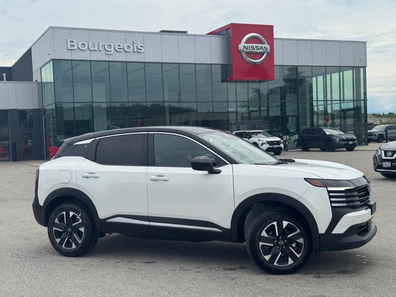 <p>Introducing the 2026 Nissan Kicks SV AWD, a dynamic SUV that stands out with its elegant white exterior. With its all-wheel-drive capability and automatic transmission, this Kicks promises a smooth and controlled ride, perfect for both urban settings and adventurous road trips.</p><p>The striking exterior, accented by alloy wheels and the chic Aspen White Tricoat/Super Black color scheme, promises to turn heads. Step inside to find a stylish interior featuring heated black front seats and a leather steering wheel that offers utmost comfort during every drive. Premium touches such as the leatherette door trim and leather gear shifter material elevate the cabin significantly.</p><p>Equipped with the latest in automotive technology, the Nissan Kicks SV ensures a connected and safe driving experience. Standard features like the backup camera and parking sensors make maneuvering a breeze. Stay entertained and in control with Bluetooth connection and smart device integration, which complement the user-friendly satellite radio system. Safety and convenience are paramount, thanks to the adaptive cruise control, lane assist, and brake assist which enhance driver confidence.</p><p>This SUV is perfect for those seeking a blend of style, technology, and performance. Whether you are a city dweller needing practicality or an adventurer who loves the open road, the new 2026 Nissan Kicks SV AWD is designed with you in mind. Contact Bourgeois Midland Nissan today to explore this incredible vehicle and experience it for yourself.</p> <p>Were thrilled to share that <strong>Nissan has been named the #1 mass market brand in initial quality</strong> by the <strong>J.D. Power 2025 U.S. Initial Quality Study</strong>! This industry-leading recognition confirms what our customers already know  when you choose <strong>Nissan</strong>, youre choosing exceptional craftsmanship, innovative technology, and dependable performance from day one.</p><p>At <strong>Bourgeois Midland Nissan</strong>, were proud to offer a full lineup of award-winning models like the <a target=_blank rel=noopener noreferrer nofollow href=https://www.bourgeoisnissan.com/inventory/?keyword=Rogue><strong>Nissan Rogue</strong></a>, <a target=_blank rel=noopener noreferrer nofollow href=https://www.bourgeoisnissan.com/inventory/?keyword=Altima&sort[id]=relevance&sort[sortDirection]=DESCENDING><strong>Altima</strong></a>, <a target=_blank rel=noopener noreferrer nofollow href=https://www.bourgeoisnissan.com/inventory/?modelId[]=P8Iy5bd_S_u3nnuzDJOpLA&keyword=Kicks&sort[id]=relevance&sort[sortDirection]=DESCENDING><strong>Kicks</strong></a>, and <a target=_blank rel=noopener noreferrer nofollow href=https://www.bourgeoisnissan.com/inventory/?&keyword=Kicks%20Play&sort[id]=relevance&sort[sortDirection]=DESCENDING><strong>Kicks Play</strong></a>  vehicles that consistently deliver on quality, comfort, and reliability.</p><p>Ready to experience the Nissan difference? Visit our Midland dealership today and discover why more Canadians are driving home in a Nissan.</p> <p><strong>Why Choose the Bourgeois Auto Group?</strong></p><p>For 80 years, Bourgeois Auto Group has been delivering exceptional automotive experiences. Our factor trained teams work to ensure you receive the shopping experience you deserve; whether you're looking for a new or new-to-you vehicle.</p><p>Shop 24/7 with our online showroom and chat service, ensuring convenience every step of the way. No hidden fees, full disclosure, and every pre-owned vehicle comes with a Carfax® report for peace of mind.</p><p>We offer a wide selection of pre-owned vehicles, all competitively priced using real-time market data. Get the best deal on your purchase and trade-in with our free Live Market Analysis report.</p><p>Looking to sell your car? We buy any make or modelno purchase required. Our simple to use online trade valuation tool will provide you with a clear, transparent selling experience whether you buy our car or not.</p><p>Backed by hundreds dedicated employees across 4 convenient locations, were here to meet all your automotive needs. Visit us in Midland or Parry Sound and explore our inventory or schedule your next service today.</p> <p><strong>Financing Your Next Vehicle with Bourgeois Midland Nissan:</strong></p><p>At Bourgeois Midland Nissan, we make financing your next vehicle simple and stress-free! Our team works with trusted lenders to find flexible options tailored to your budget. Drive away with confidenceapply today!</p><p>Take advantage of our online pre-qualification tool, backed by Equifax and TD Bank to find the payment that works for you. Simply <a href=https://www.bourgeoisnissan.com/pre-qualify-for-financing/ rel=nofollow><strong>CLICK HERE</strong></a> to use our secure online credit tool with no impact to your credit.</p>