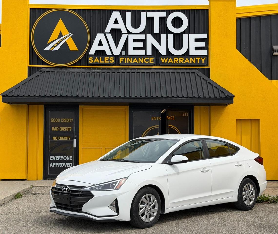 This outstanding example of a 2020 Hyundai Elantra Essential is proudly offered by Auto Avenue Airdrie. <br/> Combining efficiency, comfort, and reliability, this Hyundai Elantra Essential is the perfect choice for drivers seeking exceptional value without compromising on quality. With its modern design, smooth ride, and practical features, this sedan is ready to meet the demands of your daily commute and weekend adventures alike. <br/> With exceptionally low mileage, this 2020 Hyundai Elantra has been gently driven and carefully maintained, offering years of dependable performance ahead. Equipped with heated front seats and a rearview camera, it delivers added comfort and confidence during every drive, especially in changing weather conditions. <br/> Renowned for its durability and fuel efficiency, the Hyundai Elantra continues to be one of the most popular compact sedans on the road. Whether youre a first-time buyer, commuter, or growing family, this vehicle offers everything you need in a stylish and affordable package. <br/> A smart investment and an outstanding value, this Hyundai Elantra Essential is ready to impress. <br/> AUTO AVENUE IS AN AMVIC LICENSED DEALERSHIP, COMMITTED TO PROVIDING EXCEPTIONAL SERVICE AND QUALITY VEHICLES WITH FLEXIBLE PAYMENT OPTIONS. <br/>