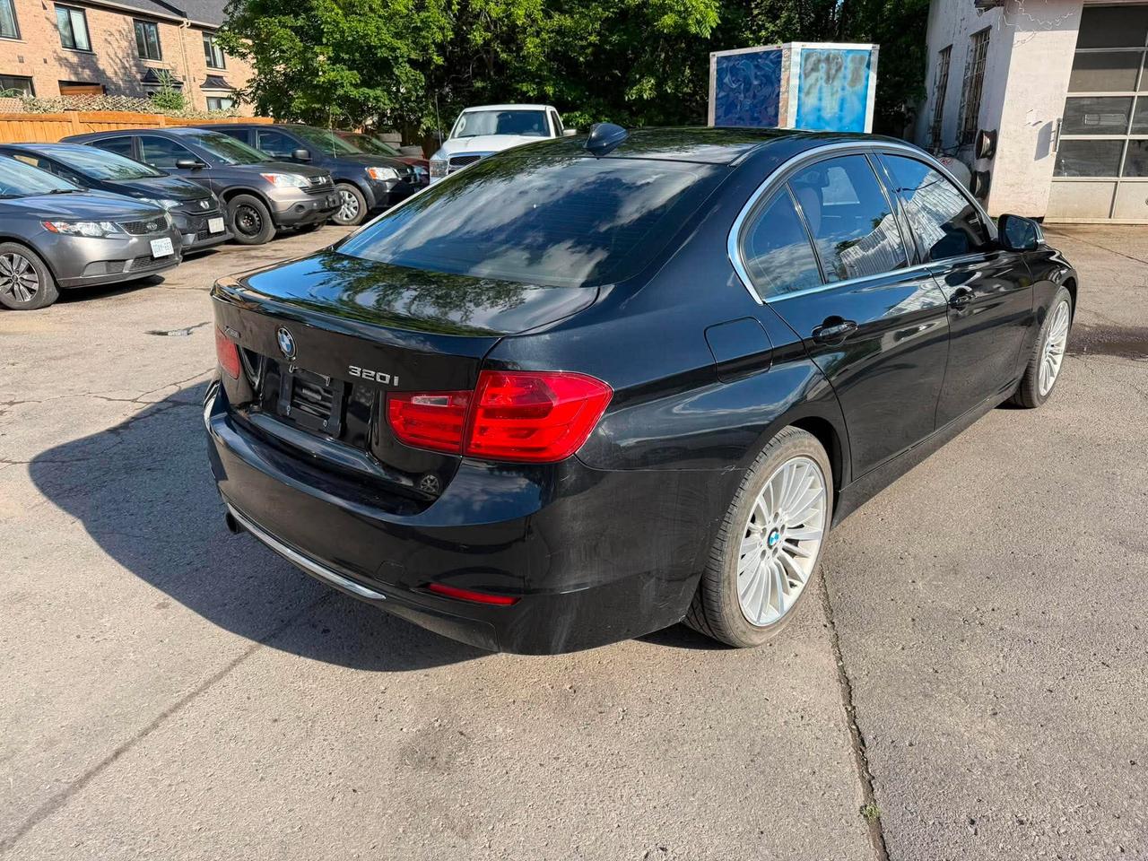 2015 BMW 3 Series 4dr Sdn 320i xDrive AWD Photo