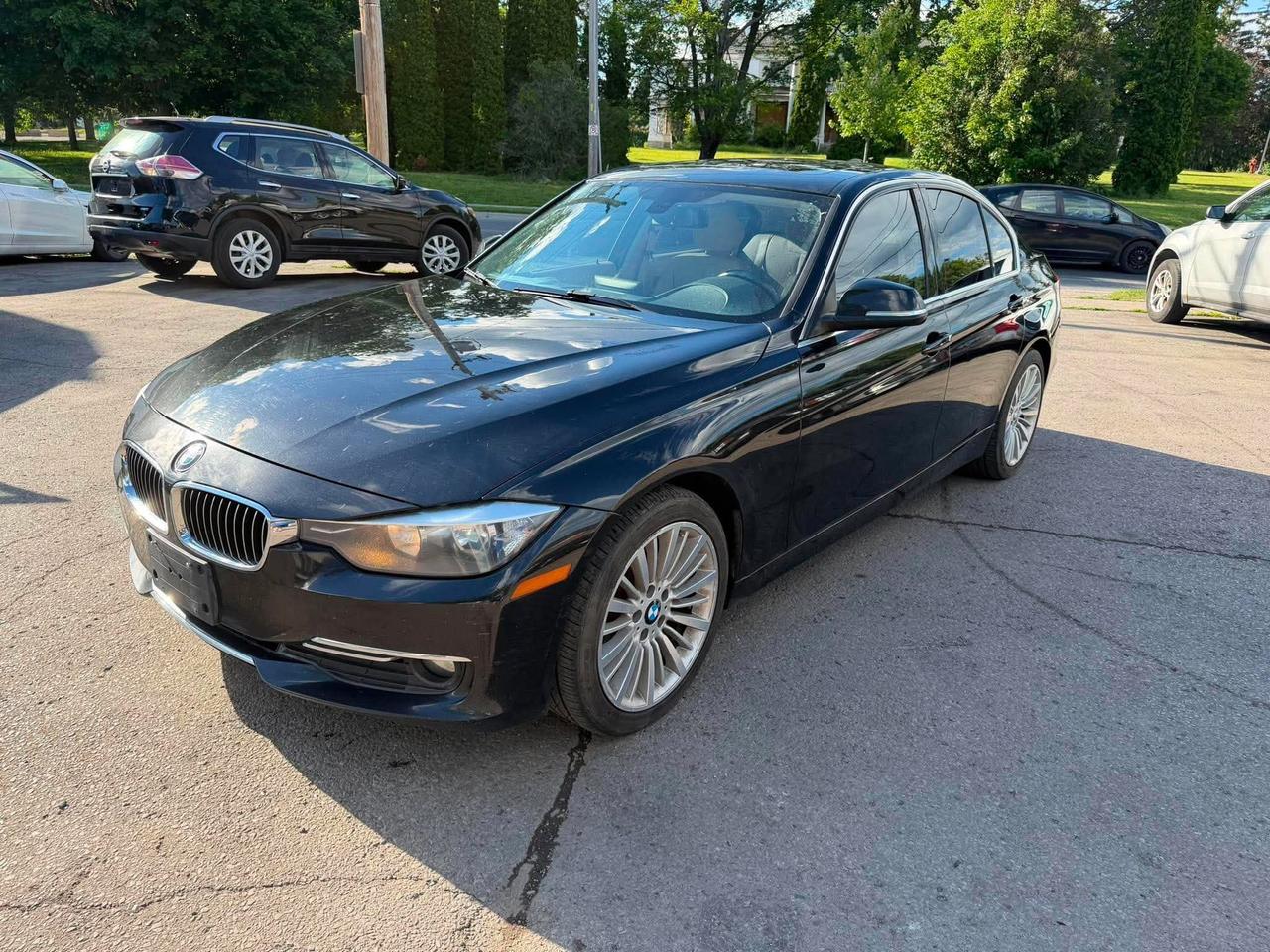 2015 BMW 3 Series 4dr Sdn 320i xDrive AWD Photo2