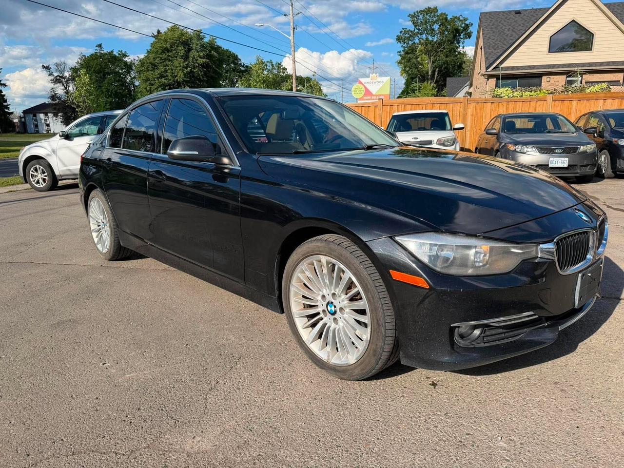 2015 BMW 3 Series 4dr Sdn 320i xDrive AWD Photo3