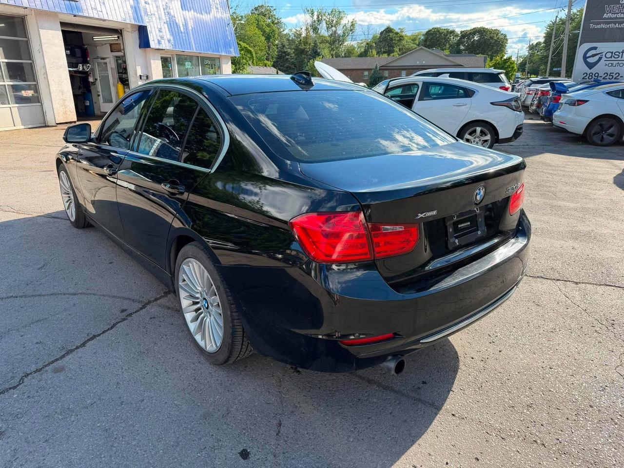 2015 BMW 3 Series 4dr Sdn 320i xDrive AWD Photo